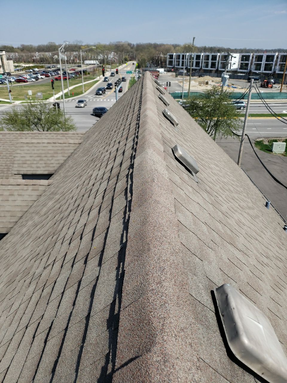Asphalt Roof Replacement and Aluminum Gutter Installment  by Custom Installations, Inc.