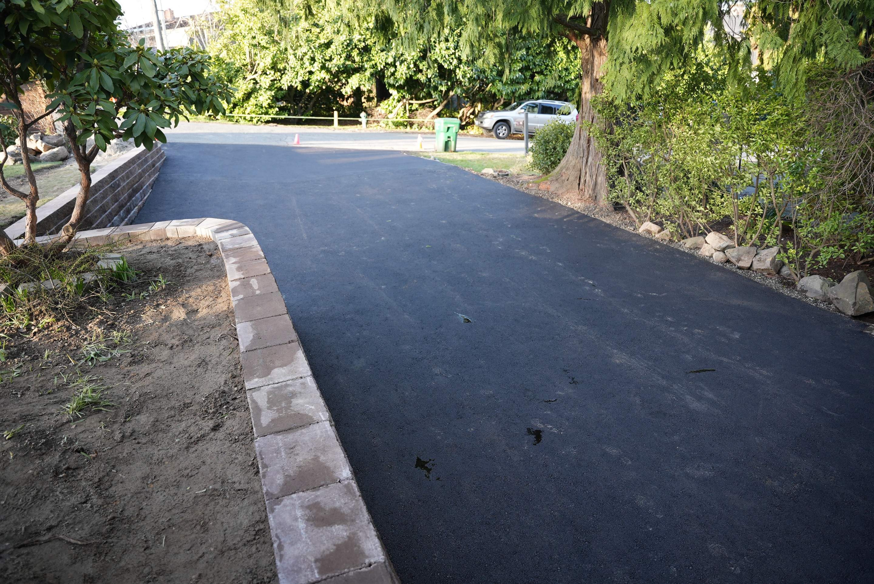 Lorra | Asphalt Driveway Repair & Retaining Wall by Jireh Asphalt & Concrete Inc 