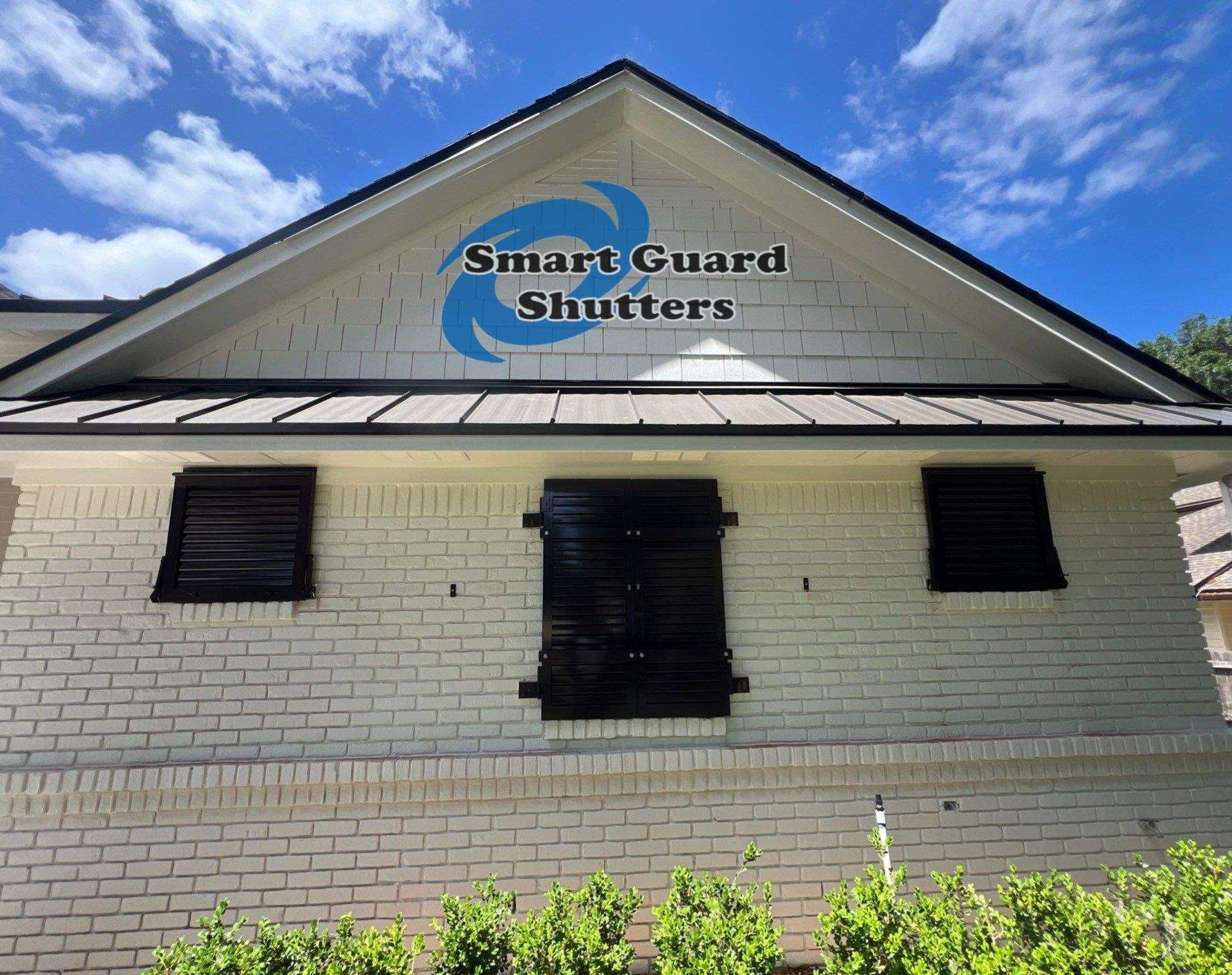 Impact Colonial & Bahama Shutters in Jet Black by Smart Guard Shutters