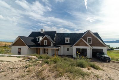 LP SmartSide Siding and Metal Roofing Installation in Garden City
