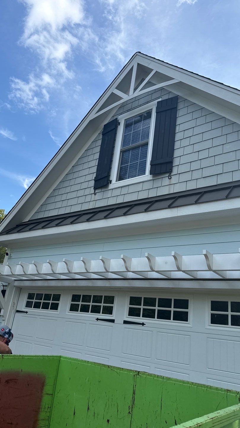 Roof replacement using GAF TimberSteel by American Home Contractors