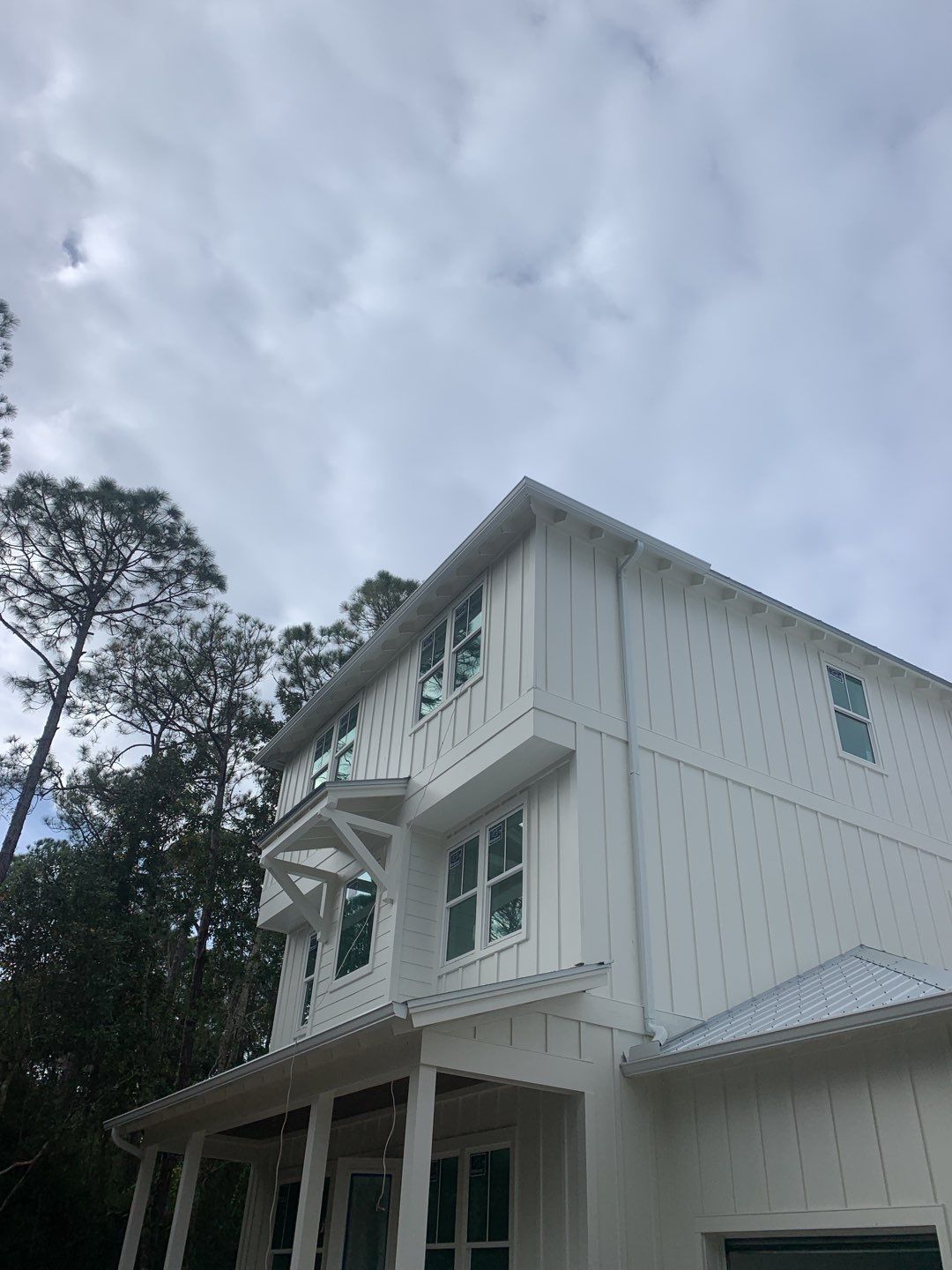 6-inch White Seamless Gutters in Santa Rosa Beach, FL by Gutter Professors