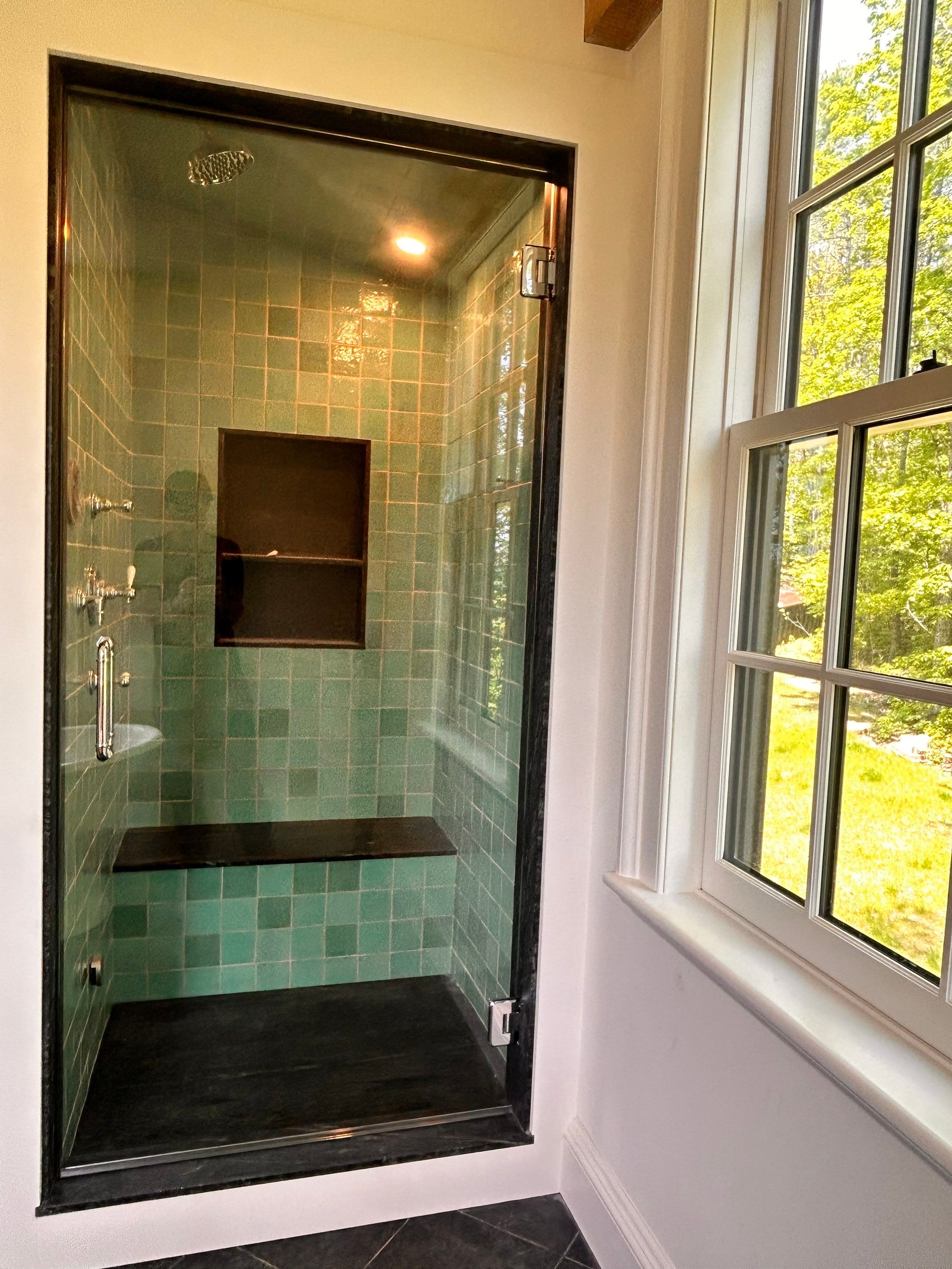 Two Showers using Tempered Shower Glass with Customer Supplied Shower Pulls by Cheshire Glass Company