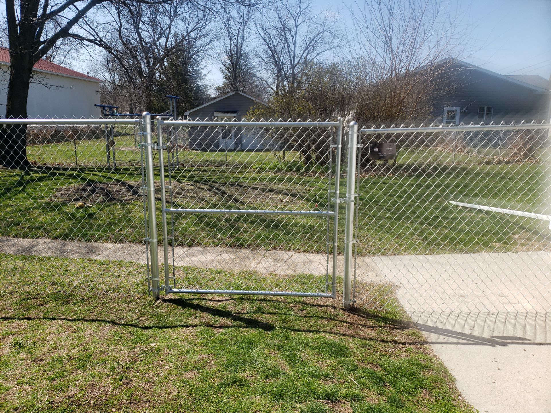 Residential Galvanized Chain Link Perimeter Fencing and Gate Installation by Perfect Picket Fence and Stain