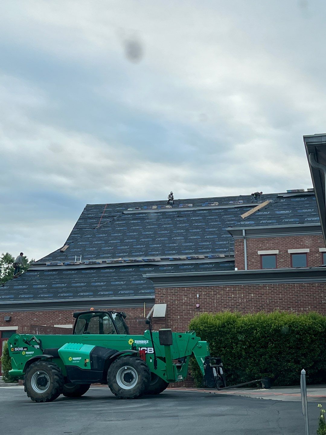 Commercial Roofing Installation using High Grade Asphalt Shingles by Carolina Trophy Roofs