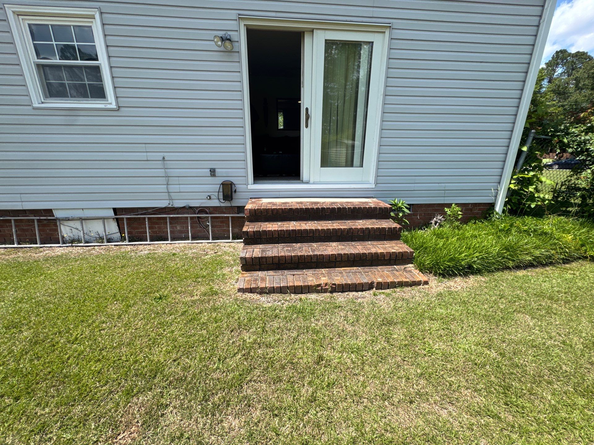 Dark Gray Siding and Custom Deck Installation in Kinston by The Remodeling Company