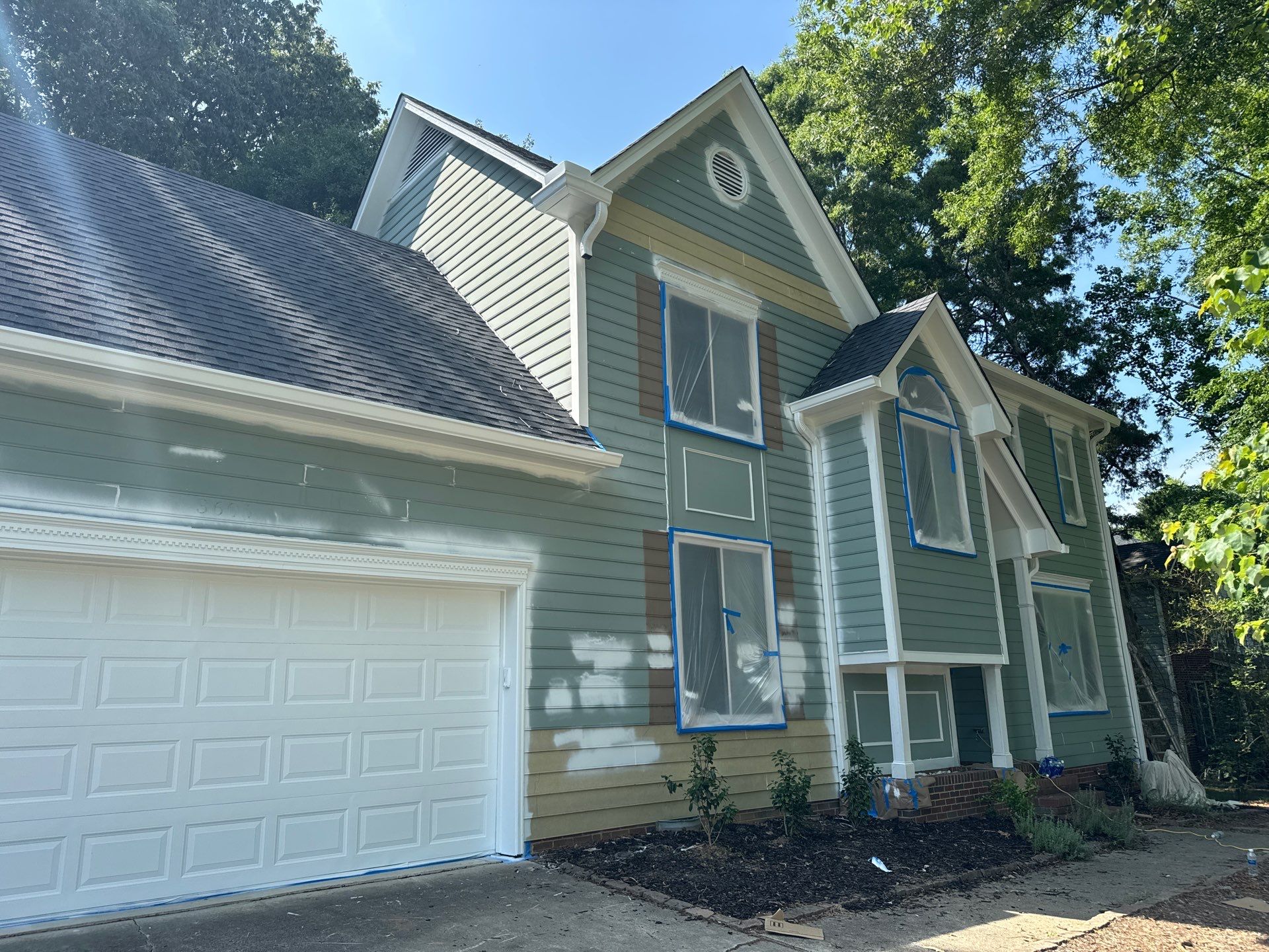 Siding Replacement and painting by GonzalezPainters & Contractors Inc 