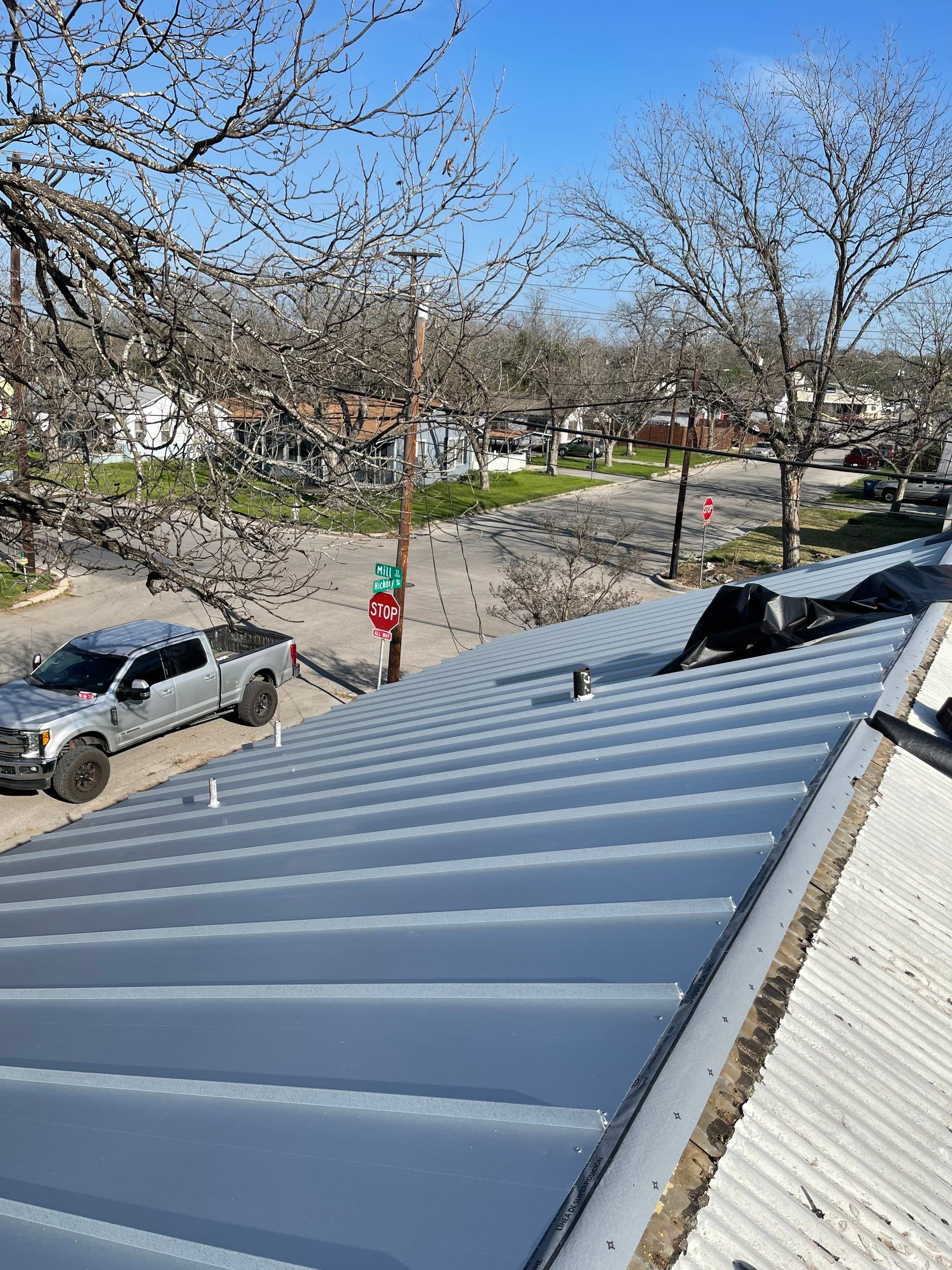 Residential Metal Roof Installation using McElroy Metal by Premier Roofing and Contracting
