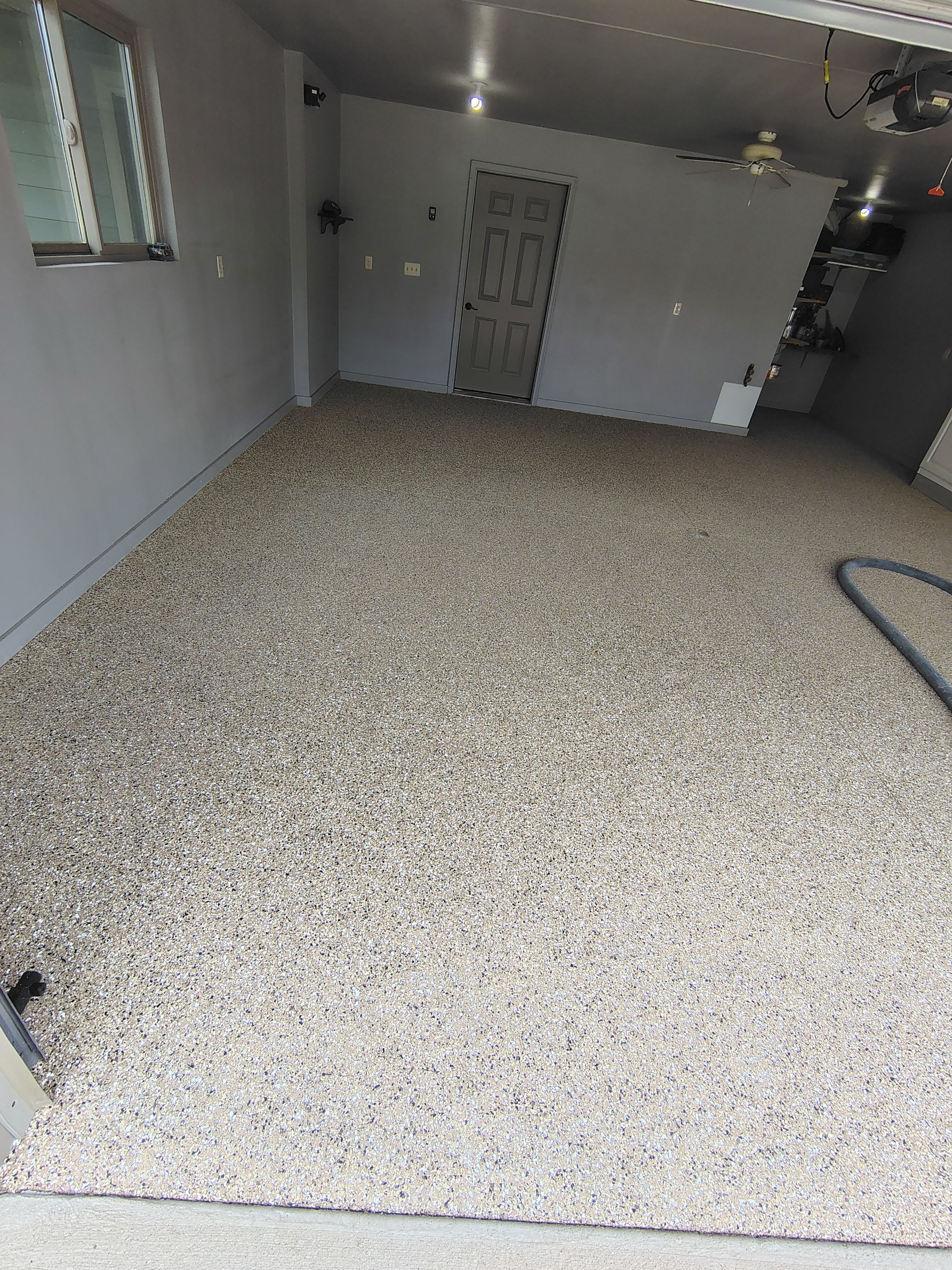Multi-Colored Speckled Epoxy Concrete Coating for Residential Garage by Select Painting, Coatings & Garage Cabinets