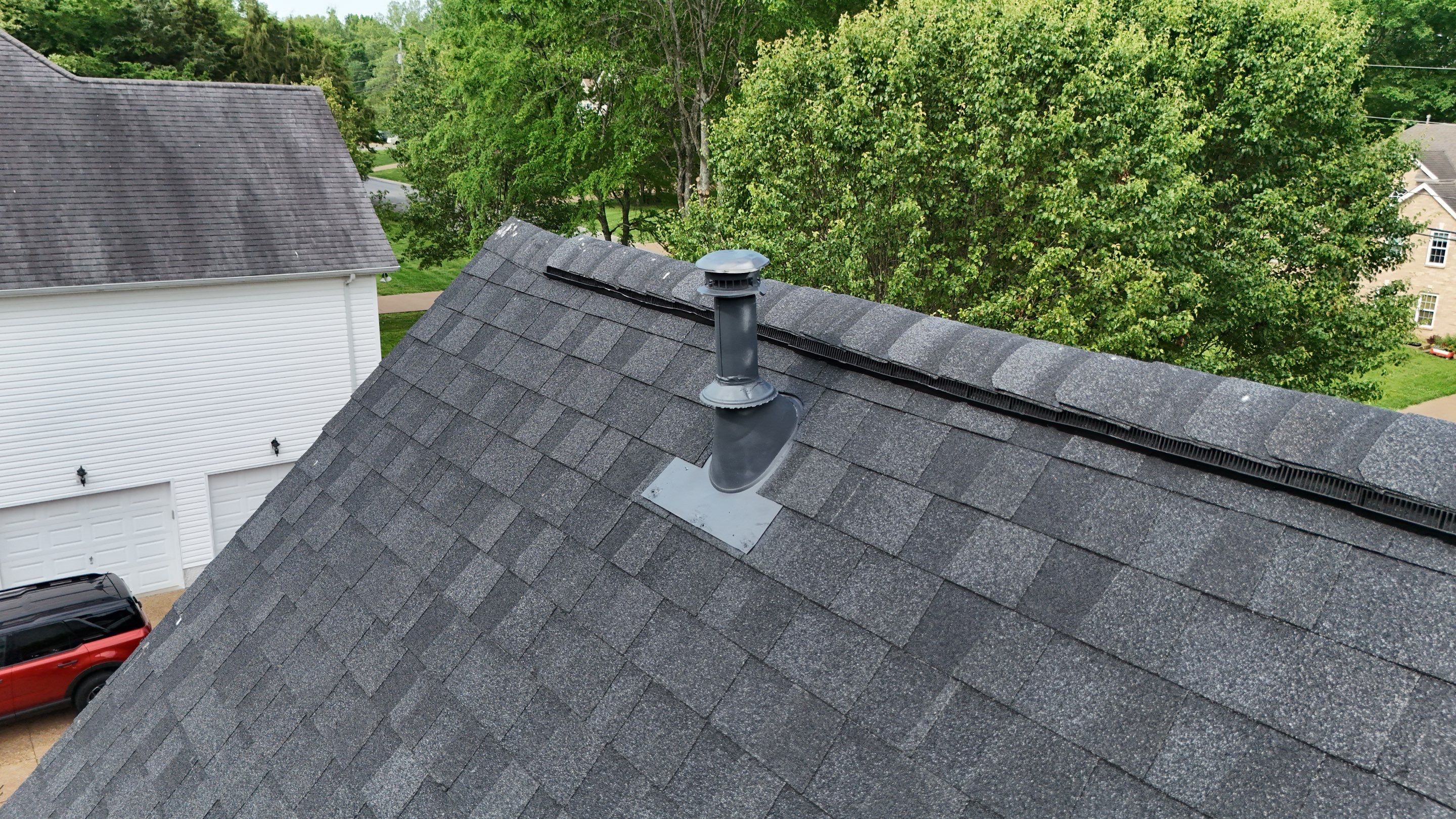 Charcoal Black Re-Roof by Royal House LLC