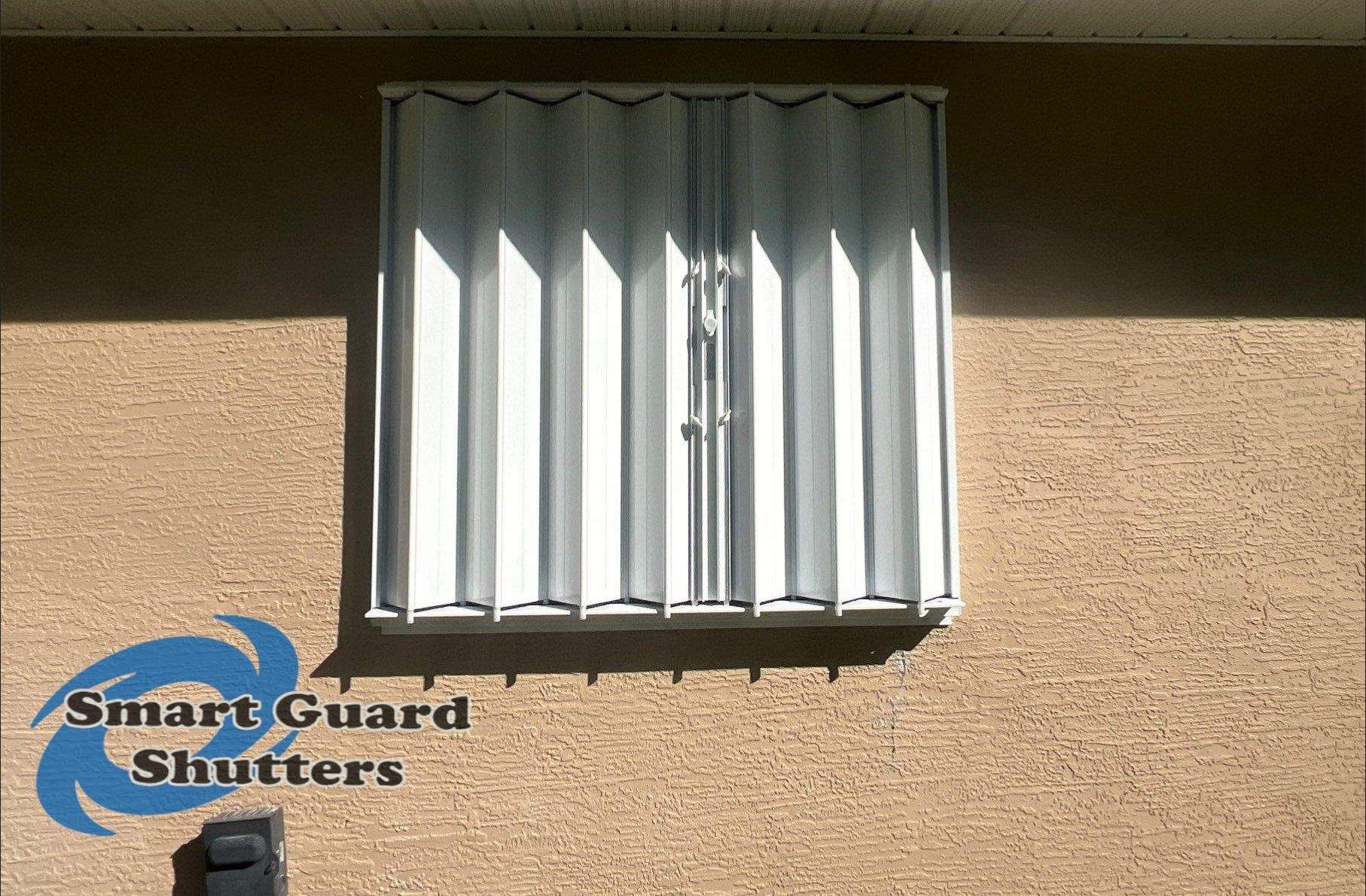 Accordion Shutters in White by Smart Guard Shutters
