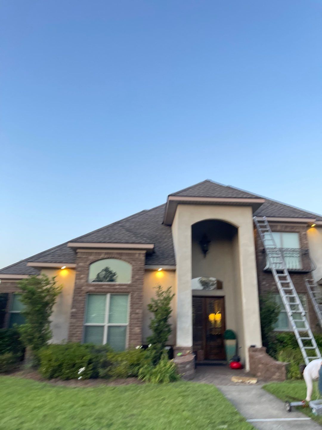 Residential Roofing Installation using Roof Replacement by American Roofing & Construction LLC