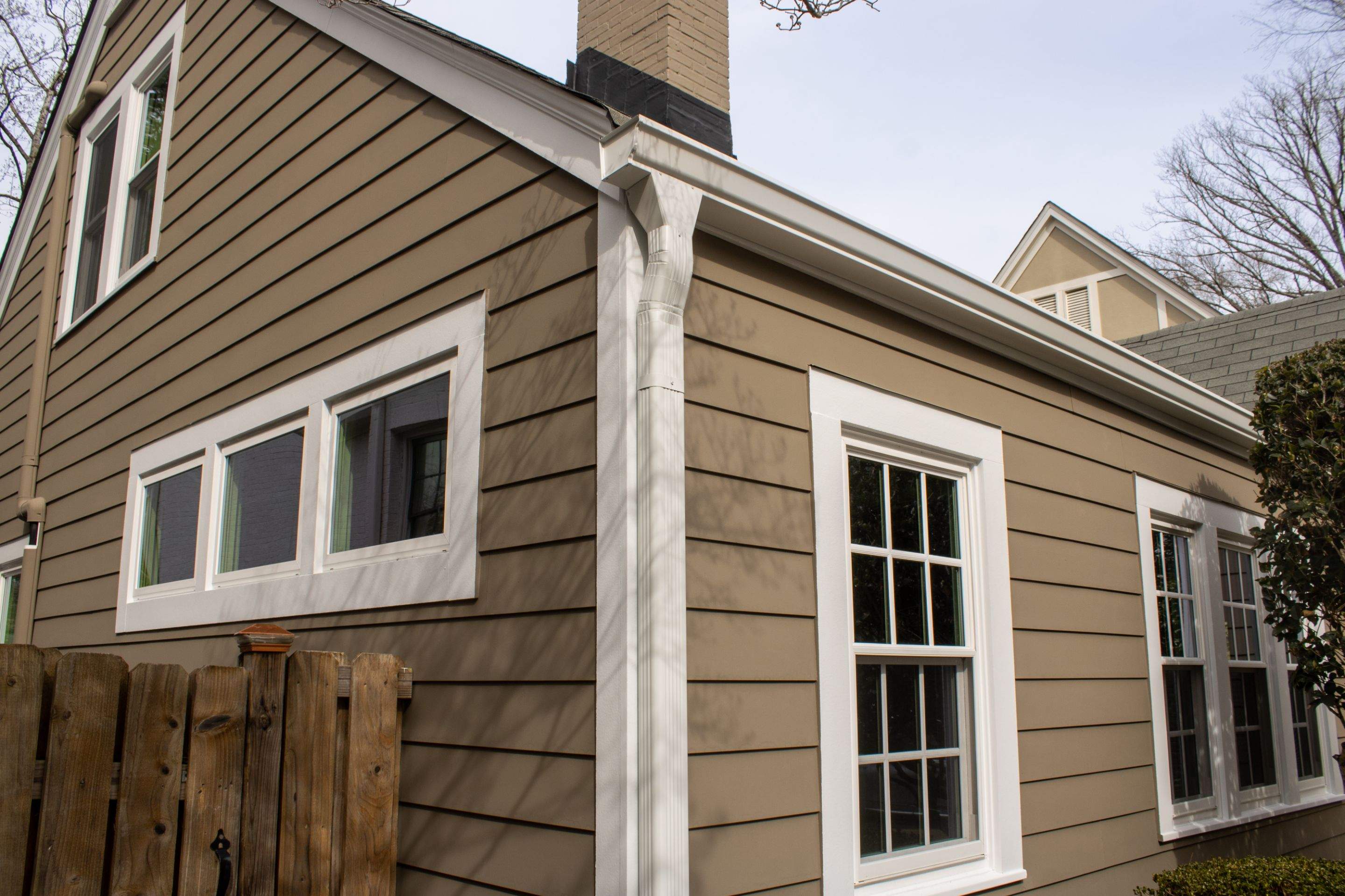 Full Siding Replacement, Deck Build, Exterior Paint, and Gutter Replacement  by Nelson Exteriors 