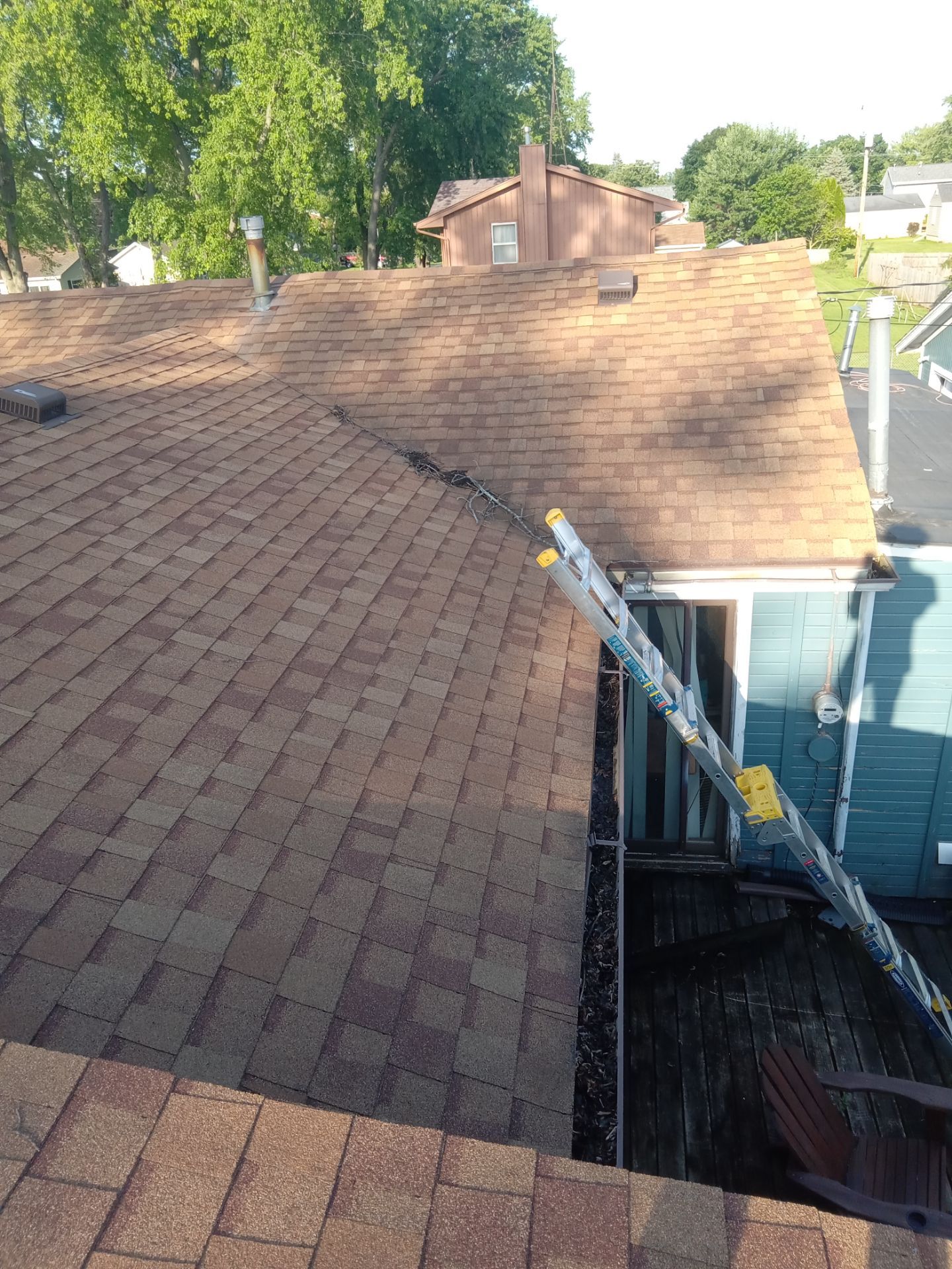 Asphalt Roof Replacement by Custom Installations