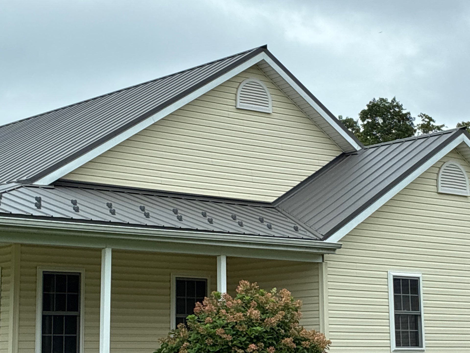 Newport Metal Roof Replacement with New Skylights by Esh Builders