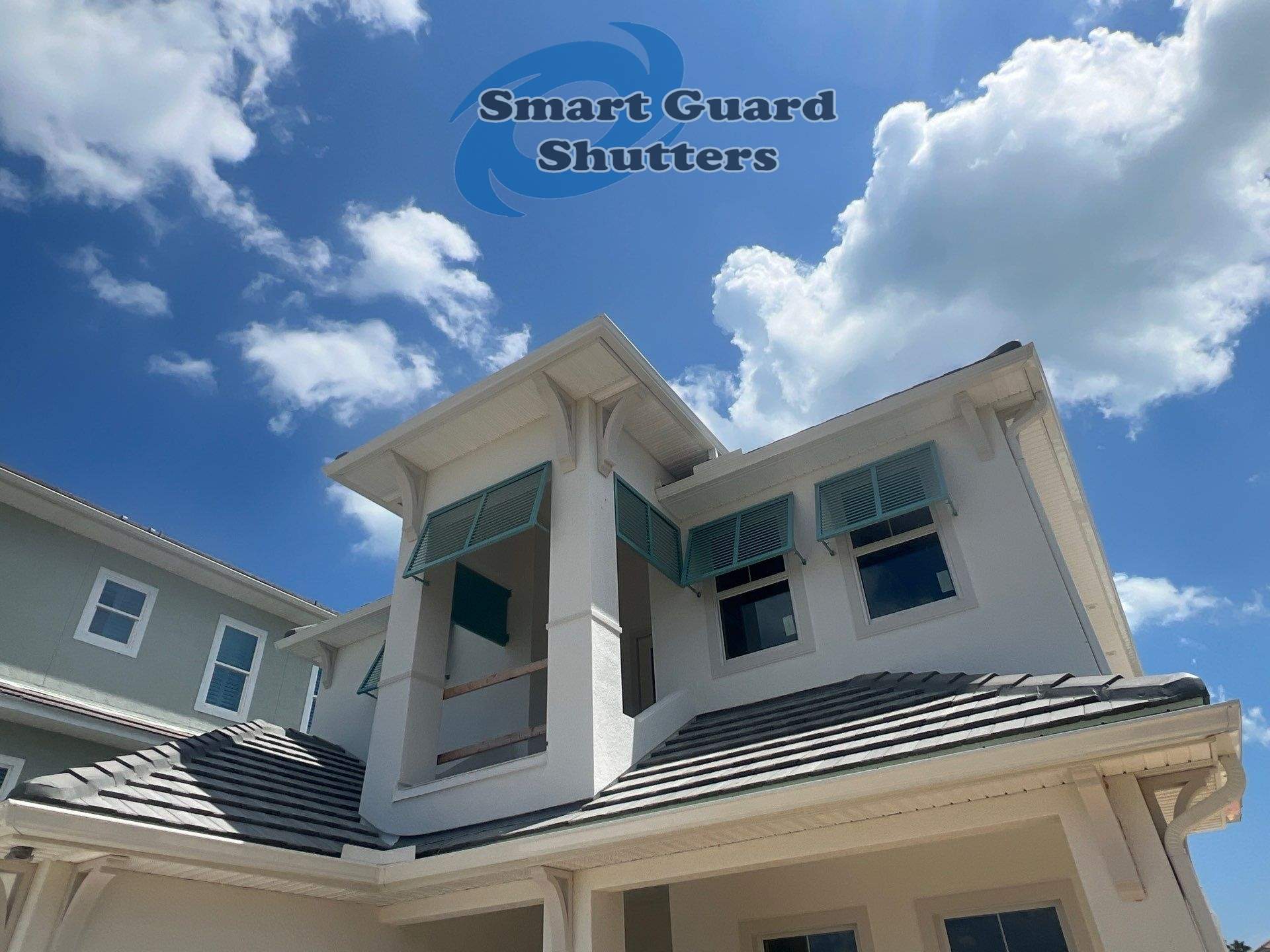 Decorative Bahamas in Pastel Turquoise by Smart Guard Shutters