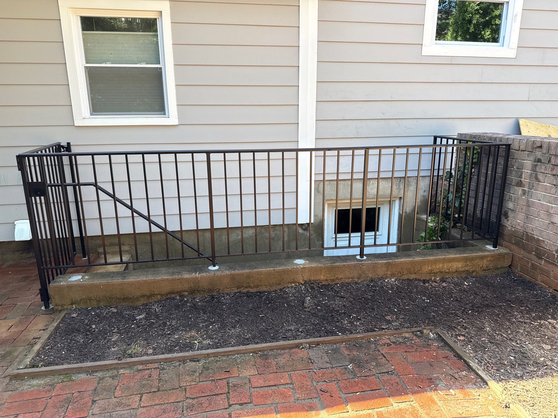 L-Shape Iron Railing & Integrated Safety Gate – Residential Exterior– McLean, VA by Capitol Iron Works