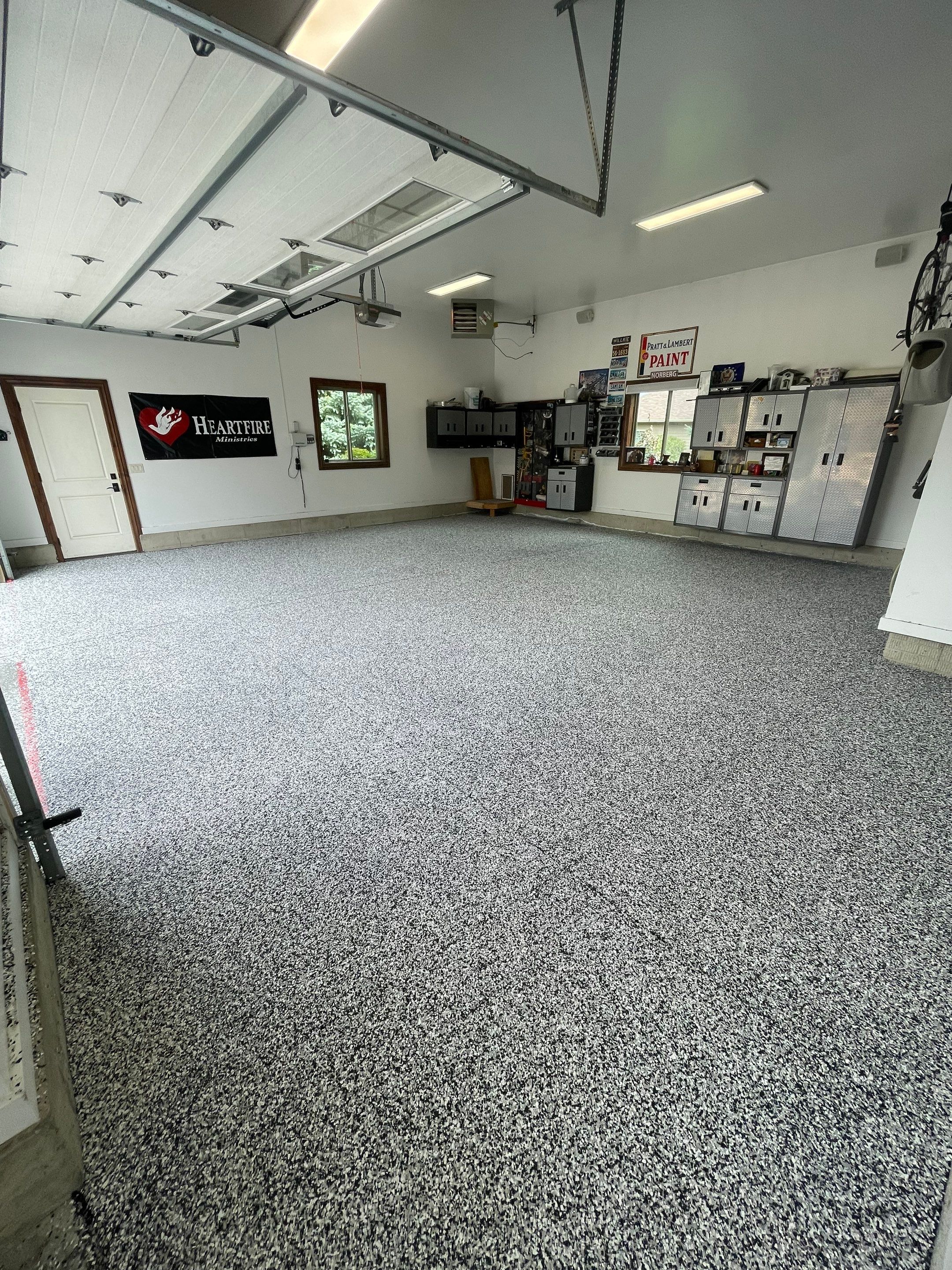 Garage Floor Coating and Domino Flake Finish in Sioux Falls by Select Painting, Coatings & Garage Cabinets