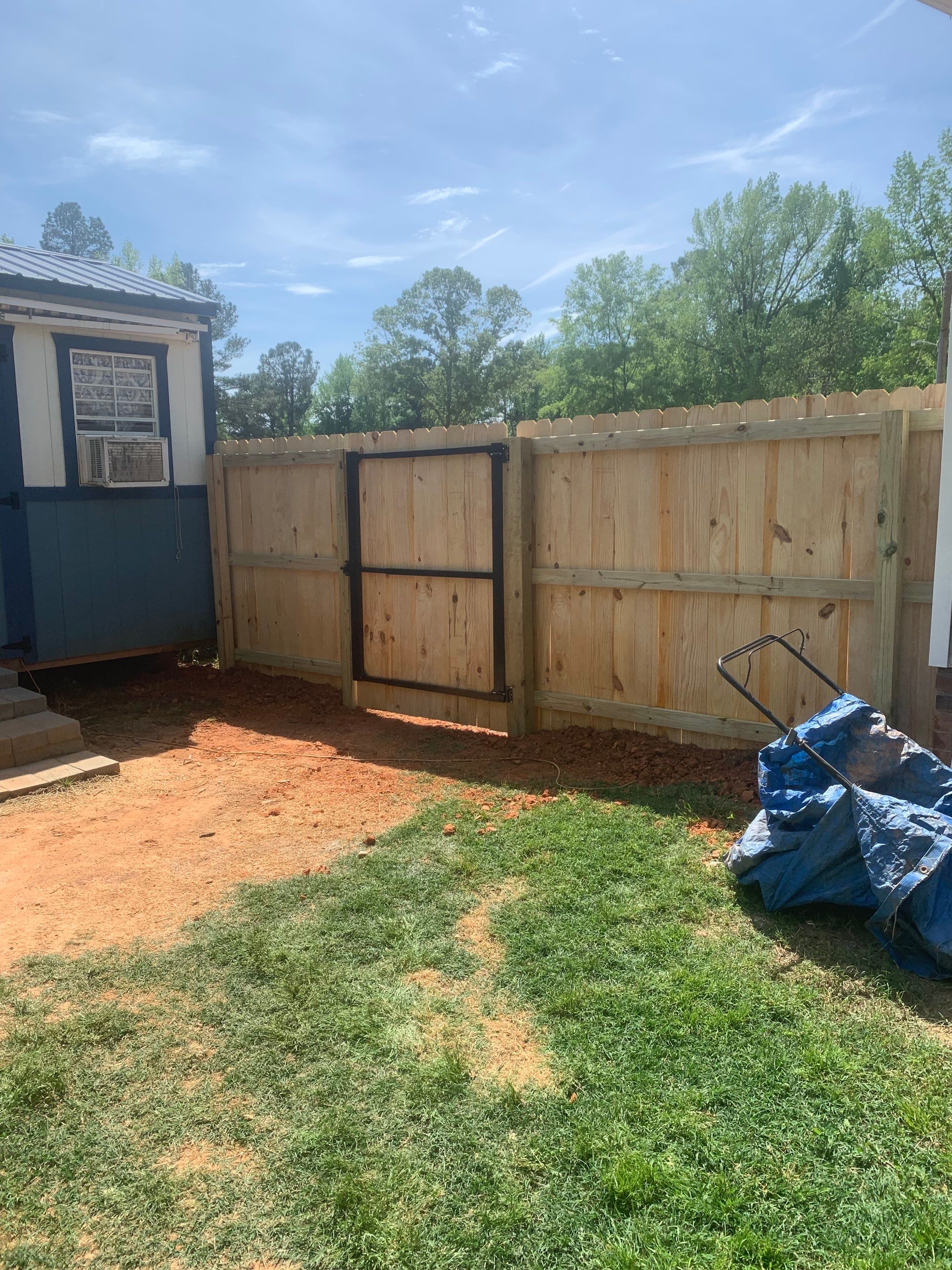 Stockade Wood Project in Roanoke Rapids by Superior Fence and Rail