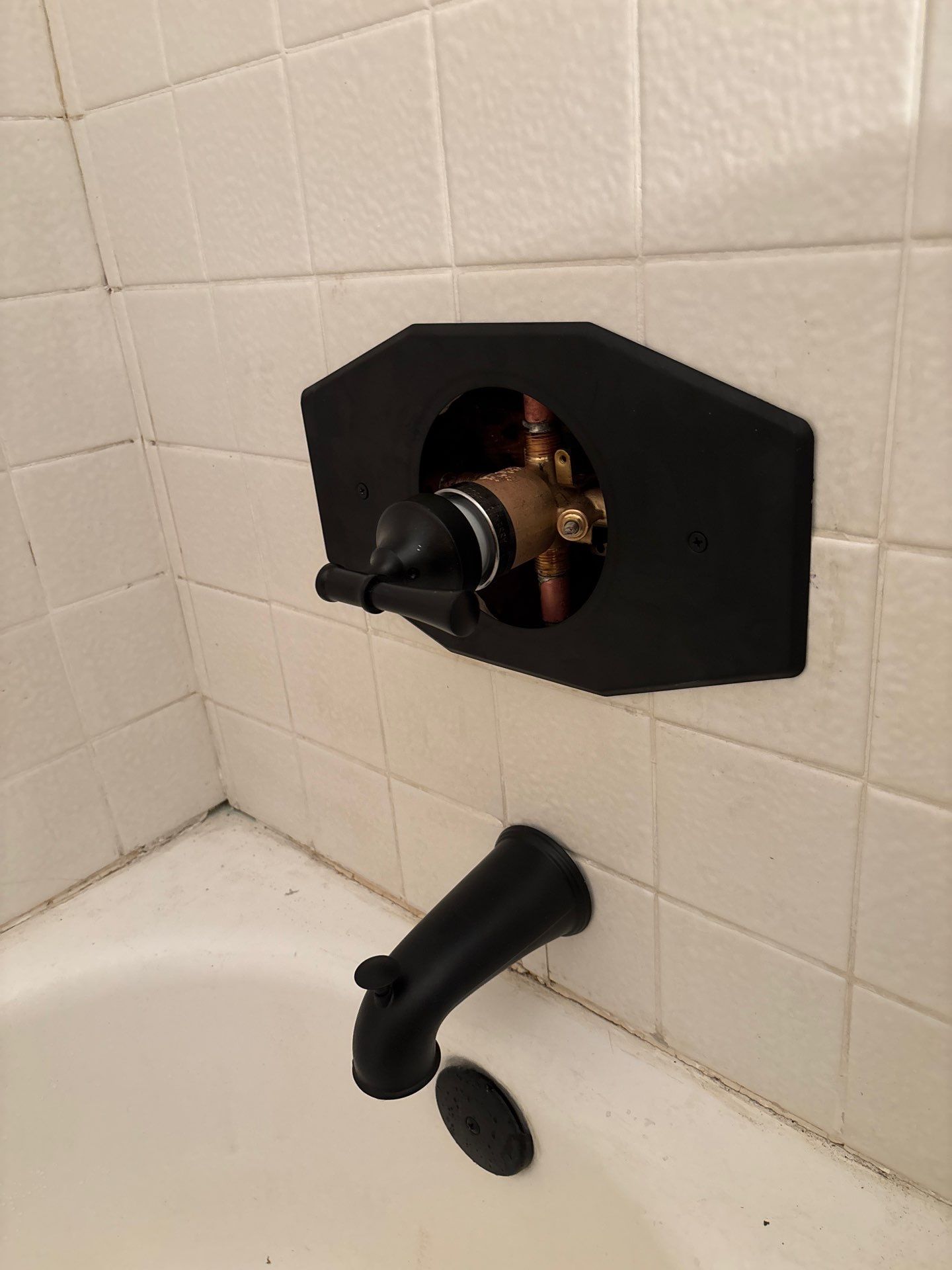 Installing Shower Fixtures by Us Plumbing