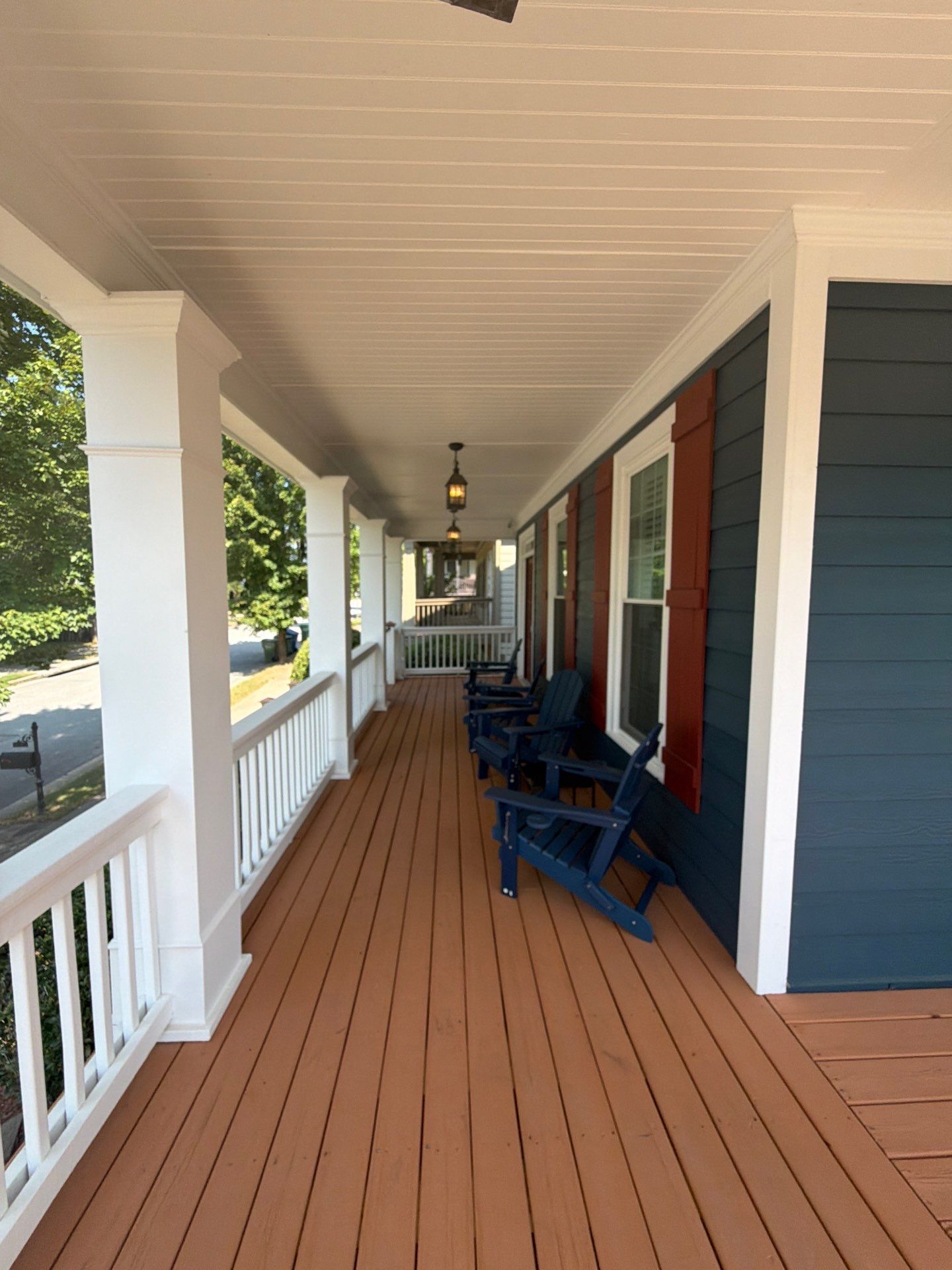 Atlanta Exterior Home Refresh with Blue Siding and Deck Staining by Swift Home Renovations 