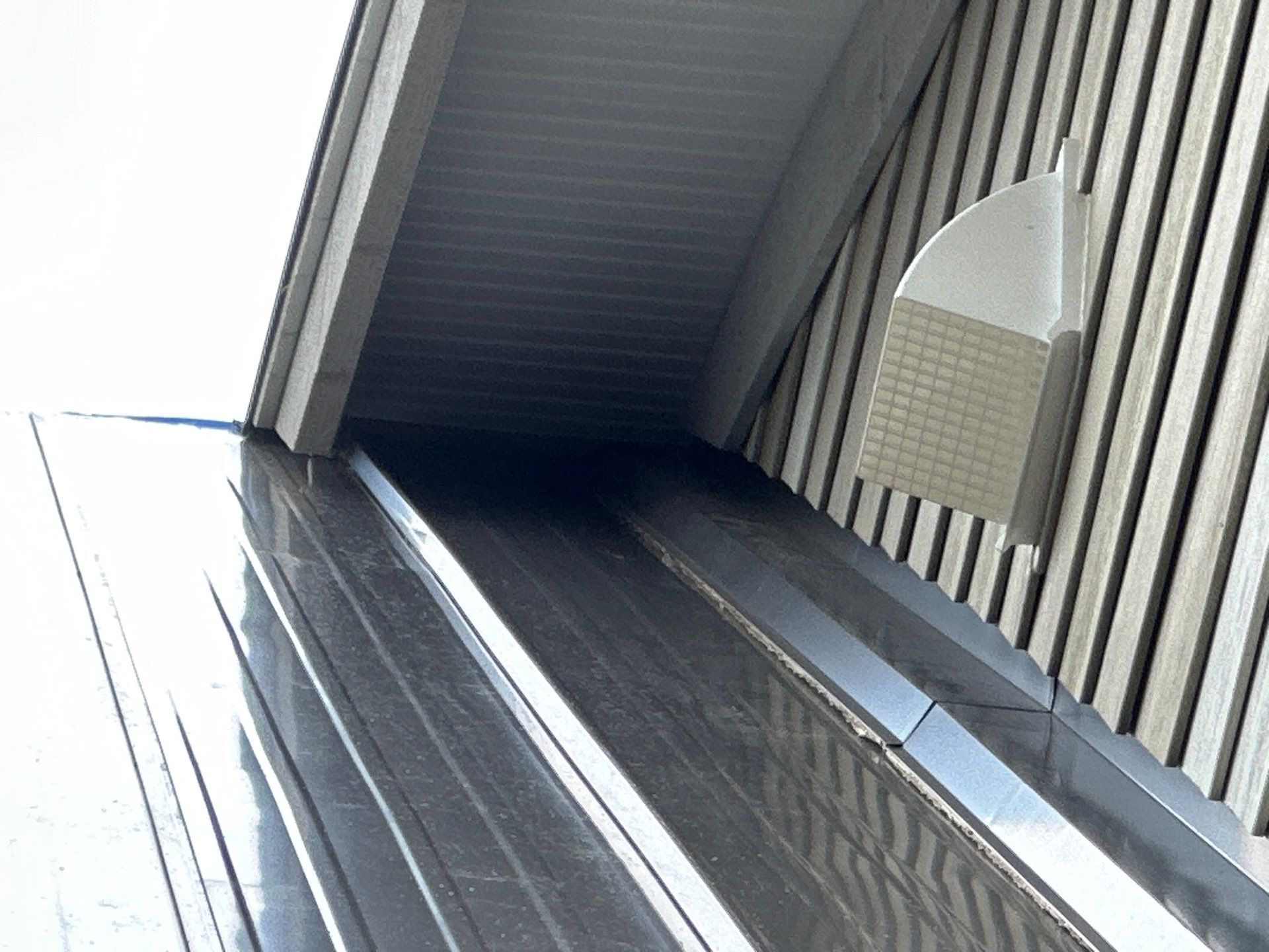 Residential Roofing Installation using 12" Prolok metal  by Top Notch Roofing Inc