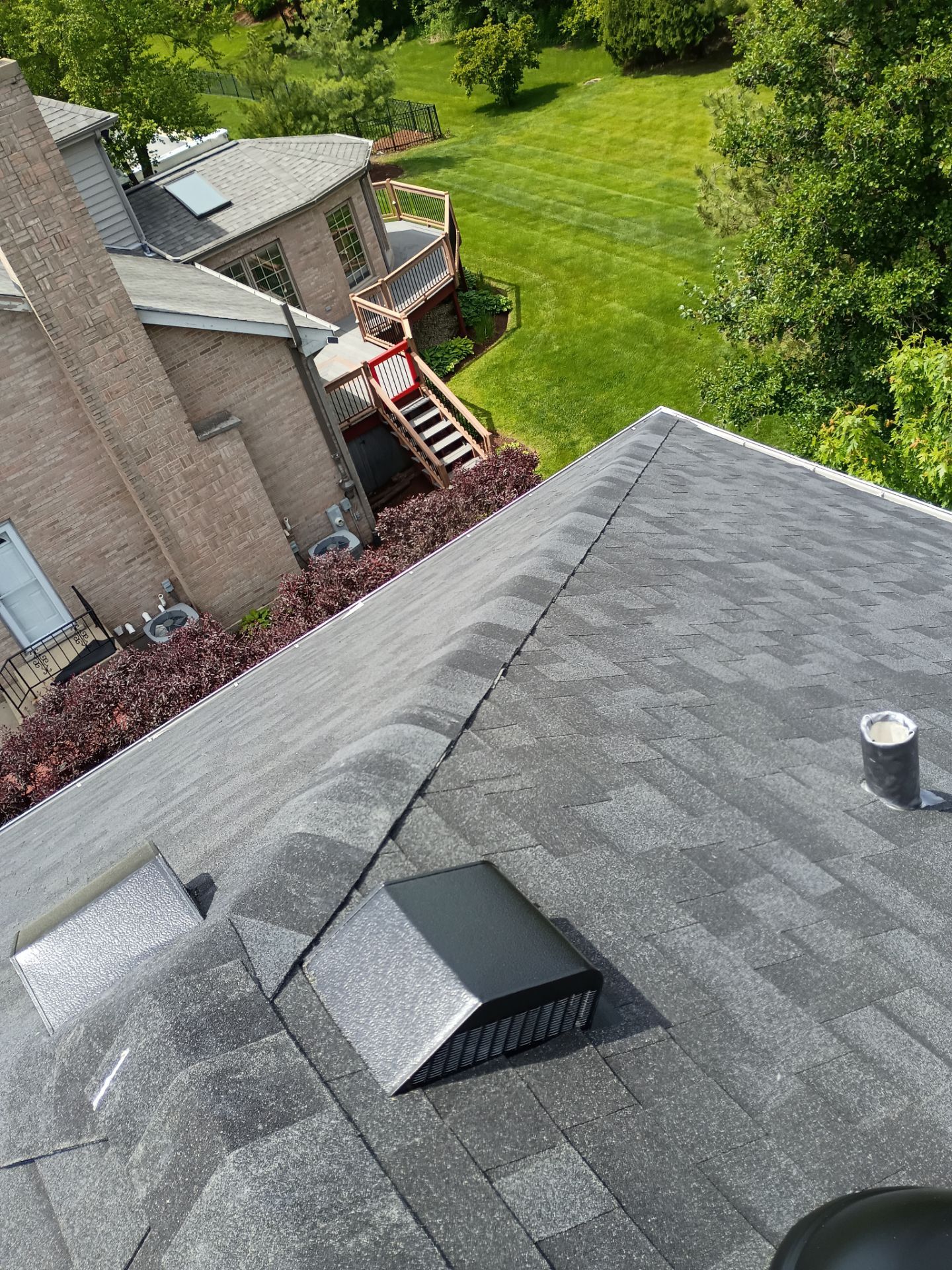 Asphalt Shingle Roof Replacement and Skylight Installation in Darien by Pro Home Services Inc