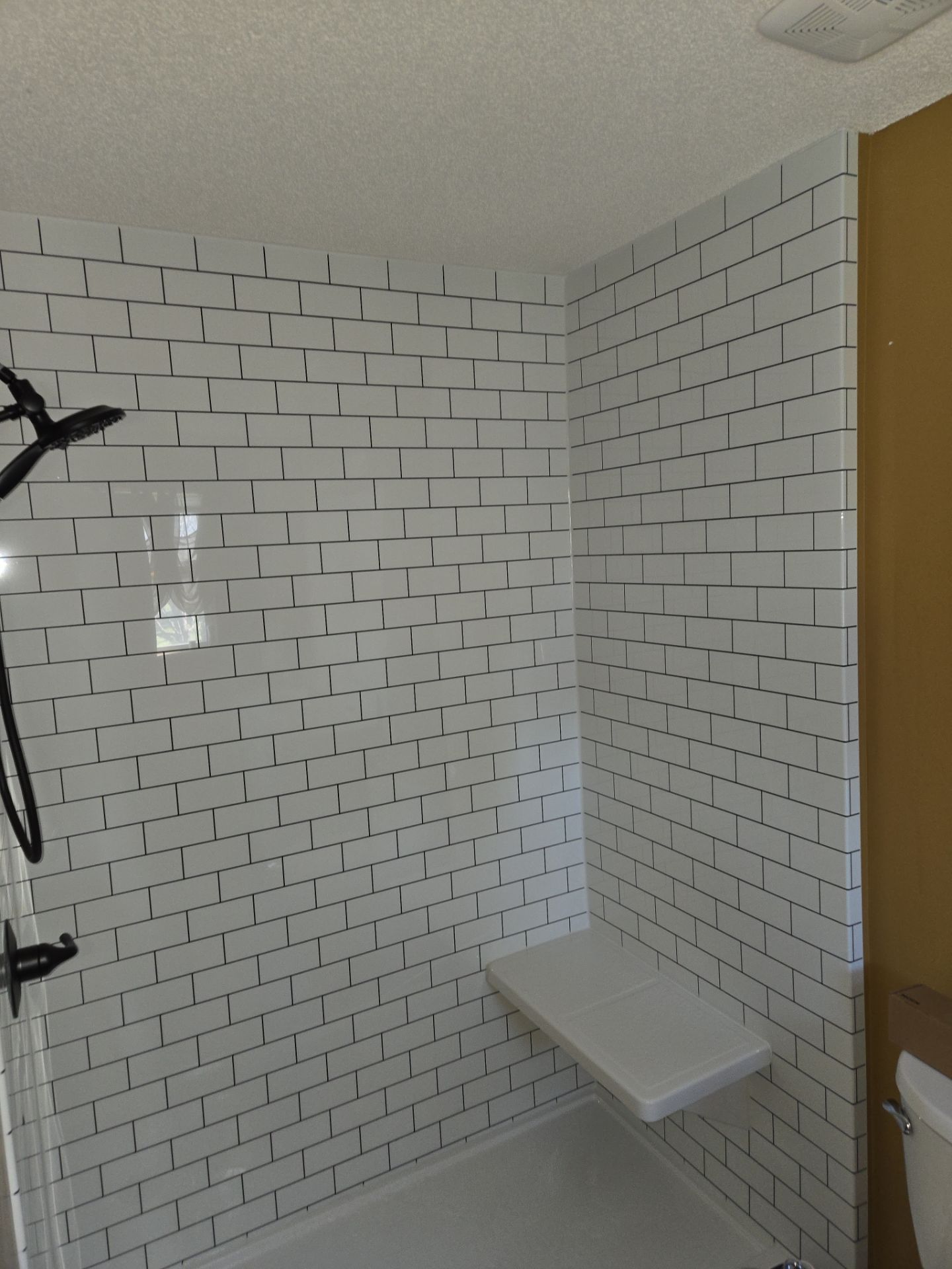 Bathroom Remodel using Luxury Vinyl Plank by The Shower Company