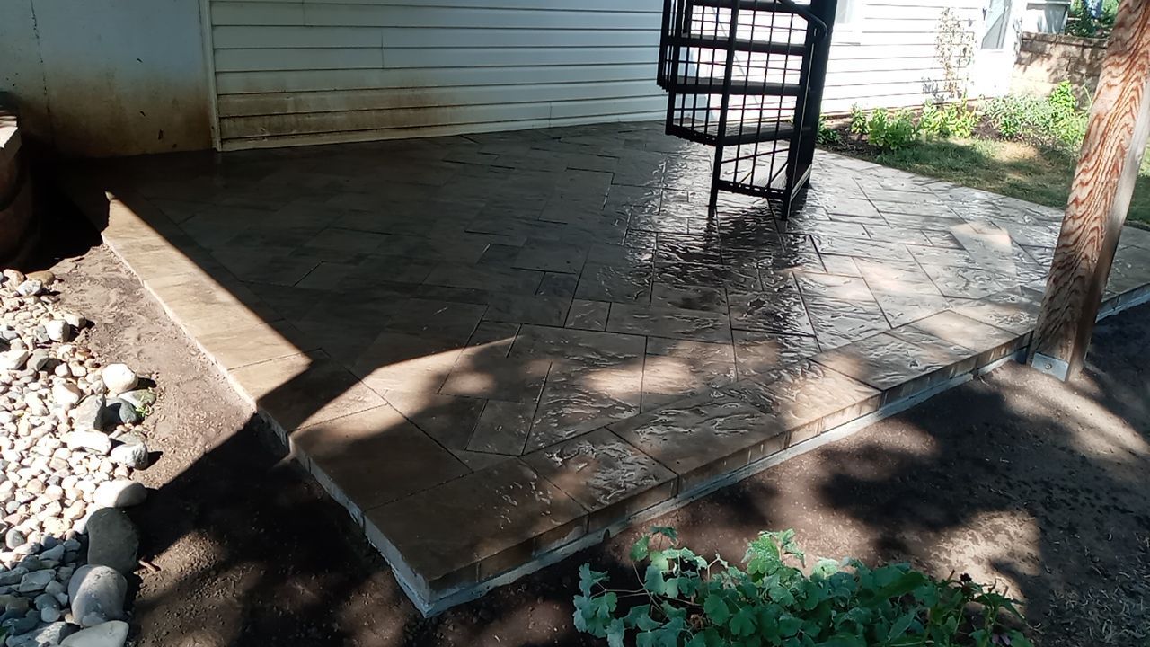 Back Yard Paver Patio by LAND ESCAPES LLC