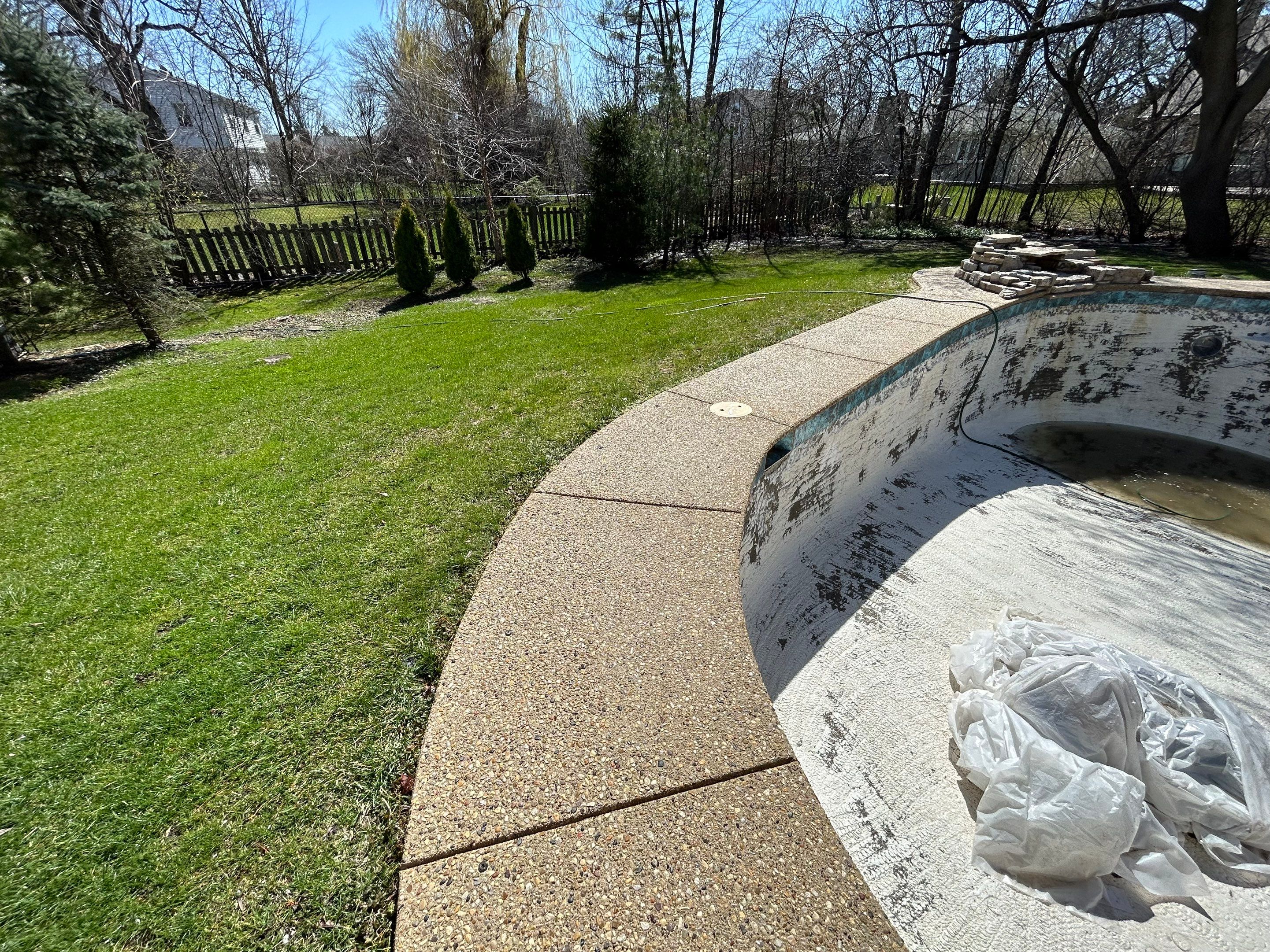 Aggregate Clean and seal using low gloss sealer by Northern Power Washing LLC.