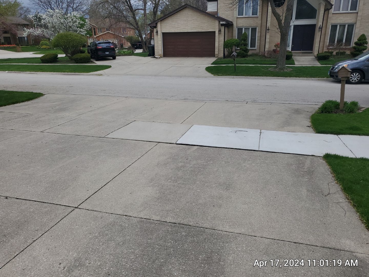 concrete patio and driveway cleaning by Northern Power Washing LLC.
