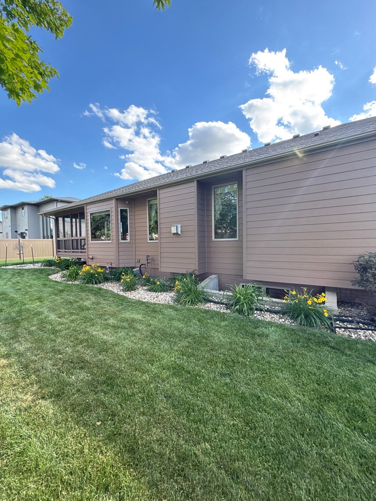 Exterior Painting and Wooden Deck Staining in Sioux Falls by Select Painting, Coatings & Garage Cabinets
