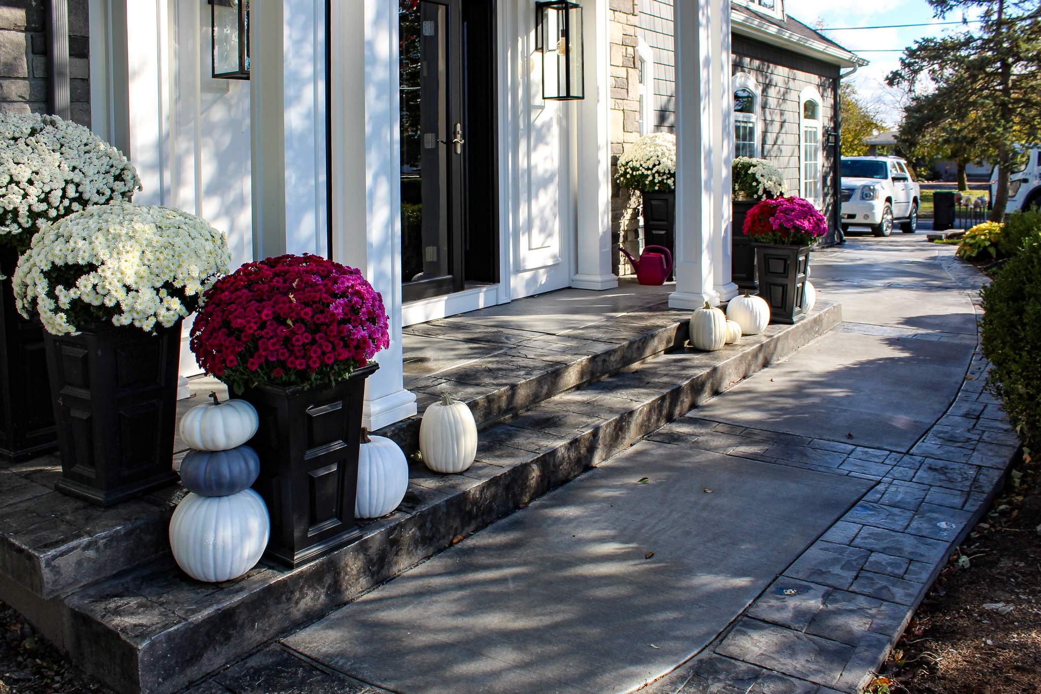 Exterior Renovations- Siding, Concrete, Railings, and Entry Door  by Ivy Lea Construction