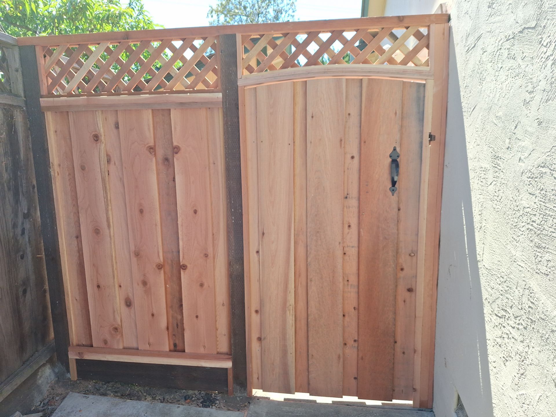 Board on Board W/ 1' Triple Lattice - 7' High by Fremont Fence Inc