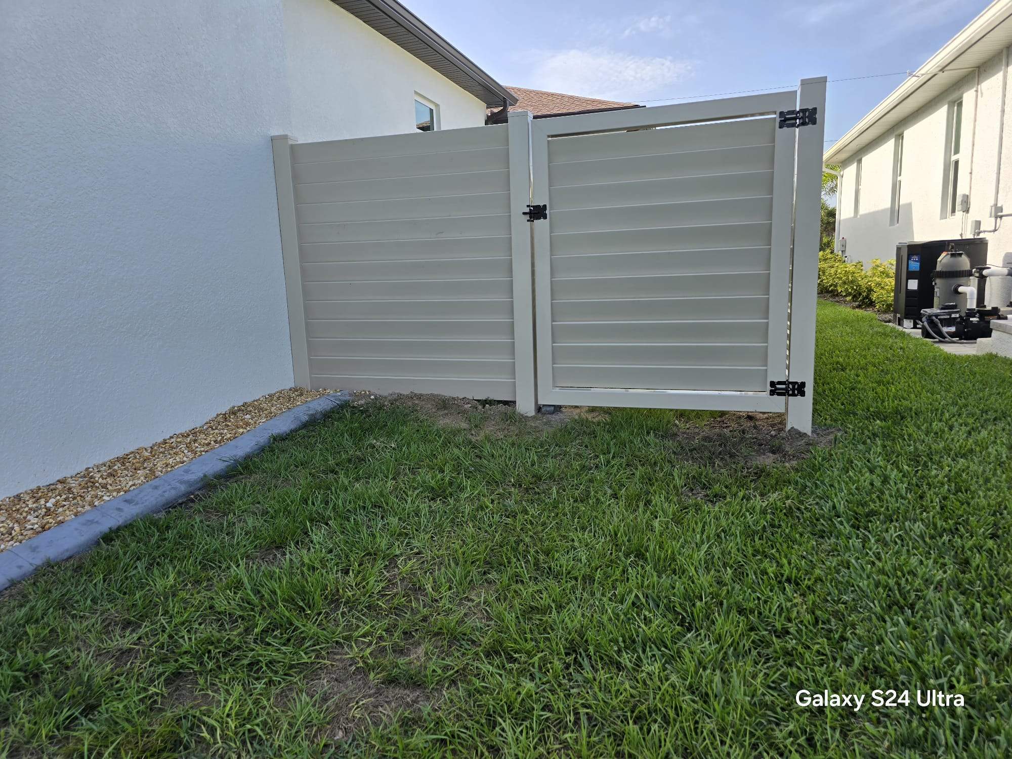 Tan Louvered Vinyl in Port Charlotte by True Fence LLC