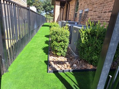 Say Goodbye to Soggy Sides: Artificial Turf & Drainage for Austin Freeman! 🌿💧