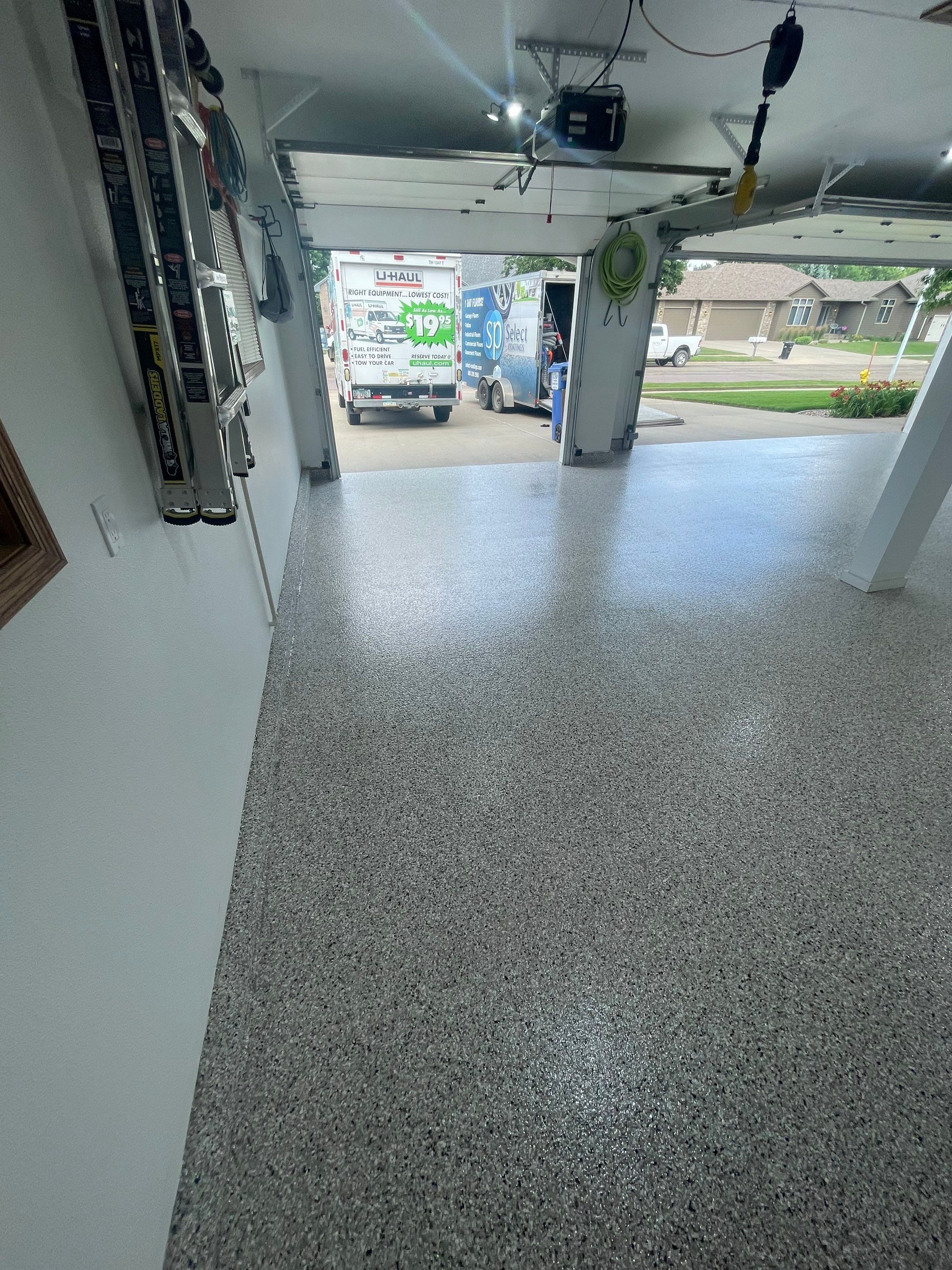 Multi-Car Garage Concrete Coating with Coyote Flake Finish in Sioux Falls by Select Painting, Coatings & Garage Cabinets