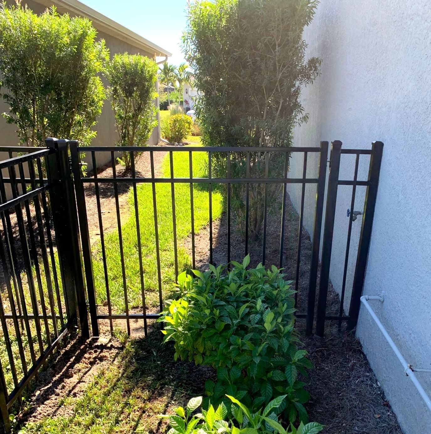 Aluminum Fence Installation using 4ft 3 Rail Black Aluminum Fence by Asap fence and gates, LLC