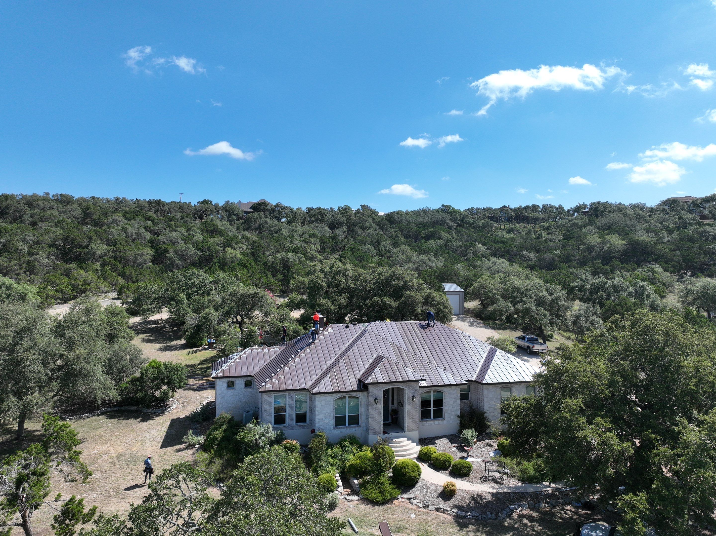 Residential Metal Roof Installation using McElroy Metal by Premier Roofing and Contracting