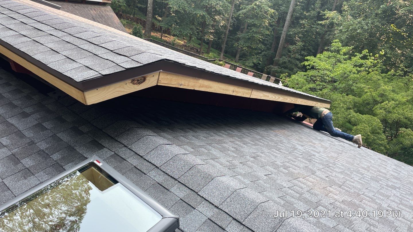 Deckhouse Roof Replacement by American Home Contractors
