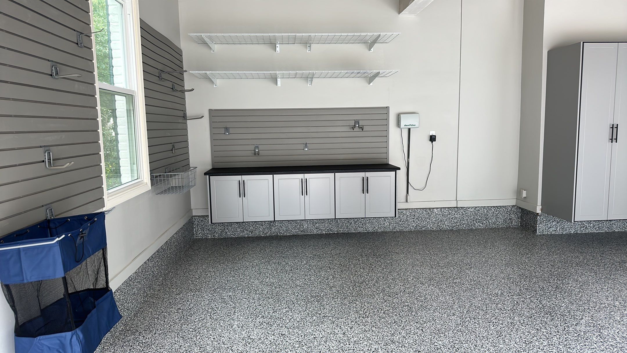 Julie H. upgraded her garage with our cabinets and wall storage options  by Banner Garage