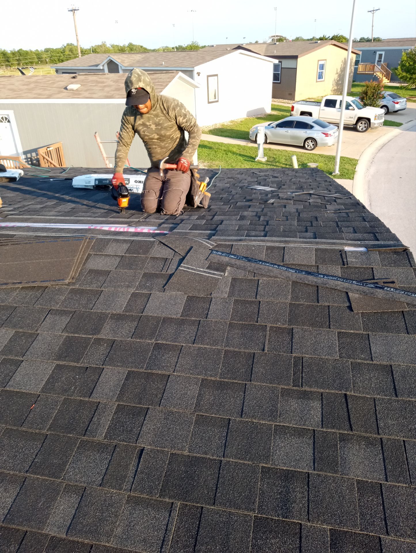 Storm Damage Roofing Replacement and Fence Restoration by Caliber Restoration LLC