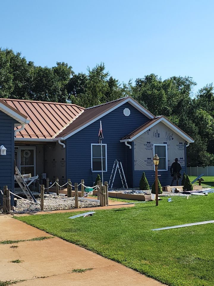 Residential Roofing and Siding Installation using Copper Penny Standing Seam by 4Ever Metal Roofing