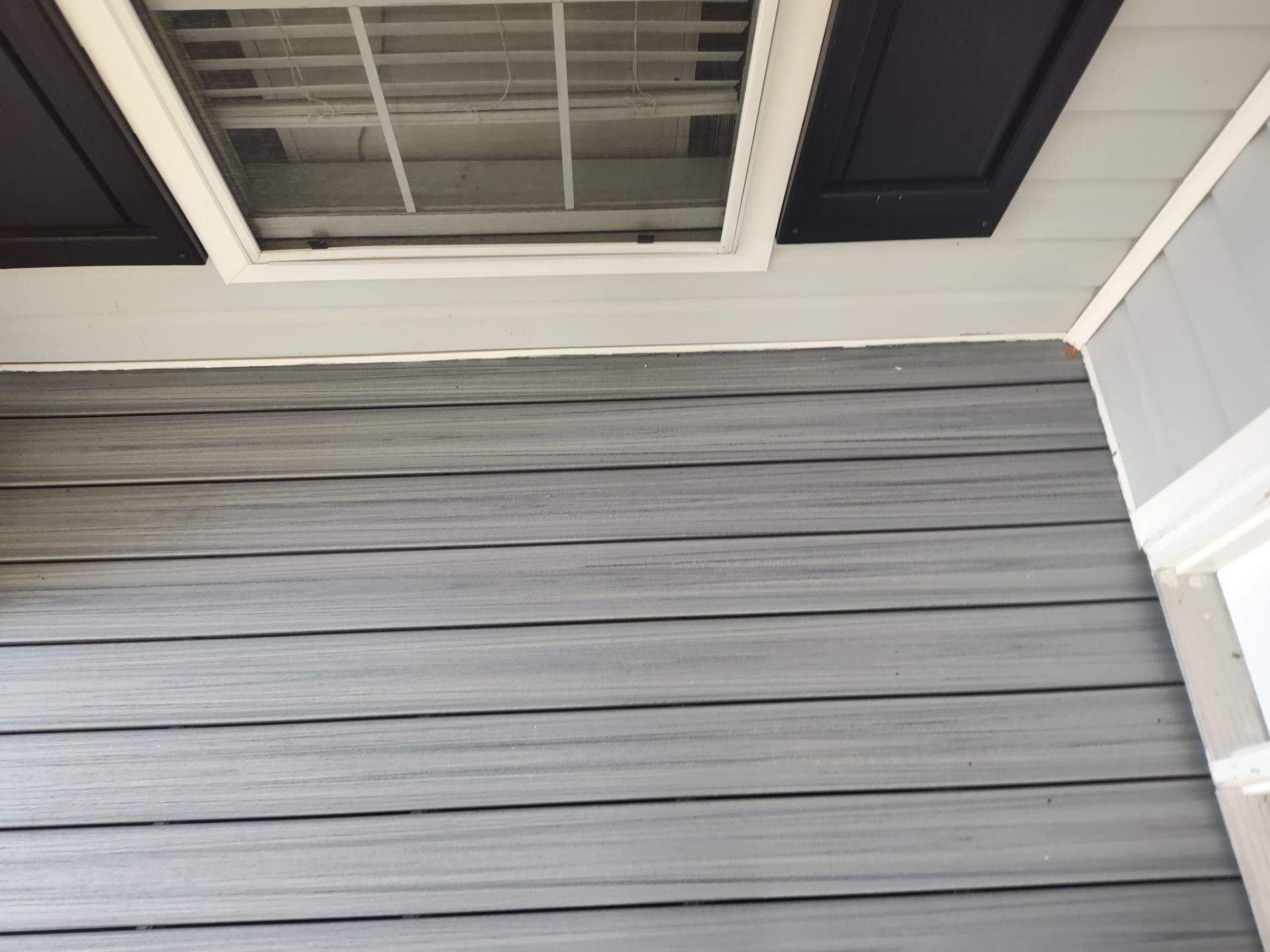 Outside porch and concreate work by Cornerstone Home Builders, LLC
