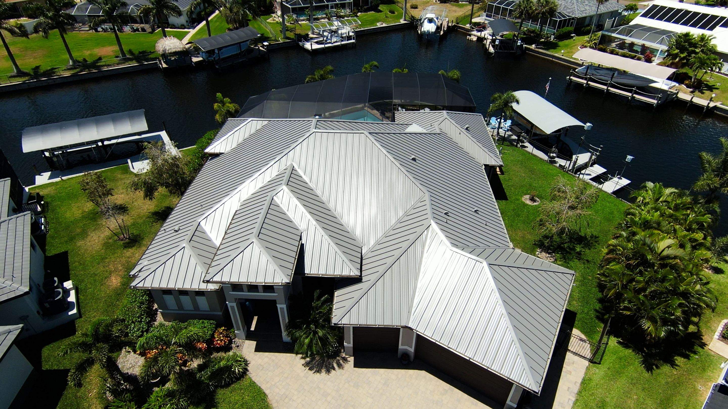 Residential Roofing Installation using Gulf Coast Metals Gulf Seam Panels by Four Peaks Roofing
