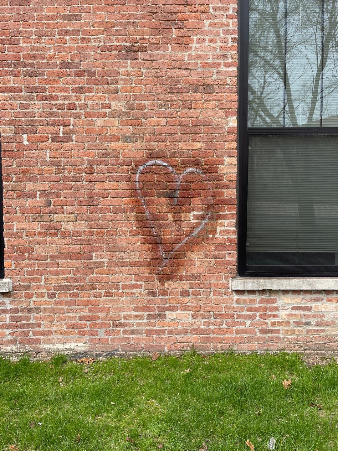 Graffiti removal  using Graffiti remover by Northern Power Washing LLC.