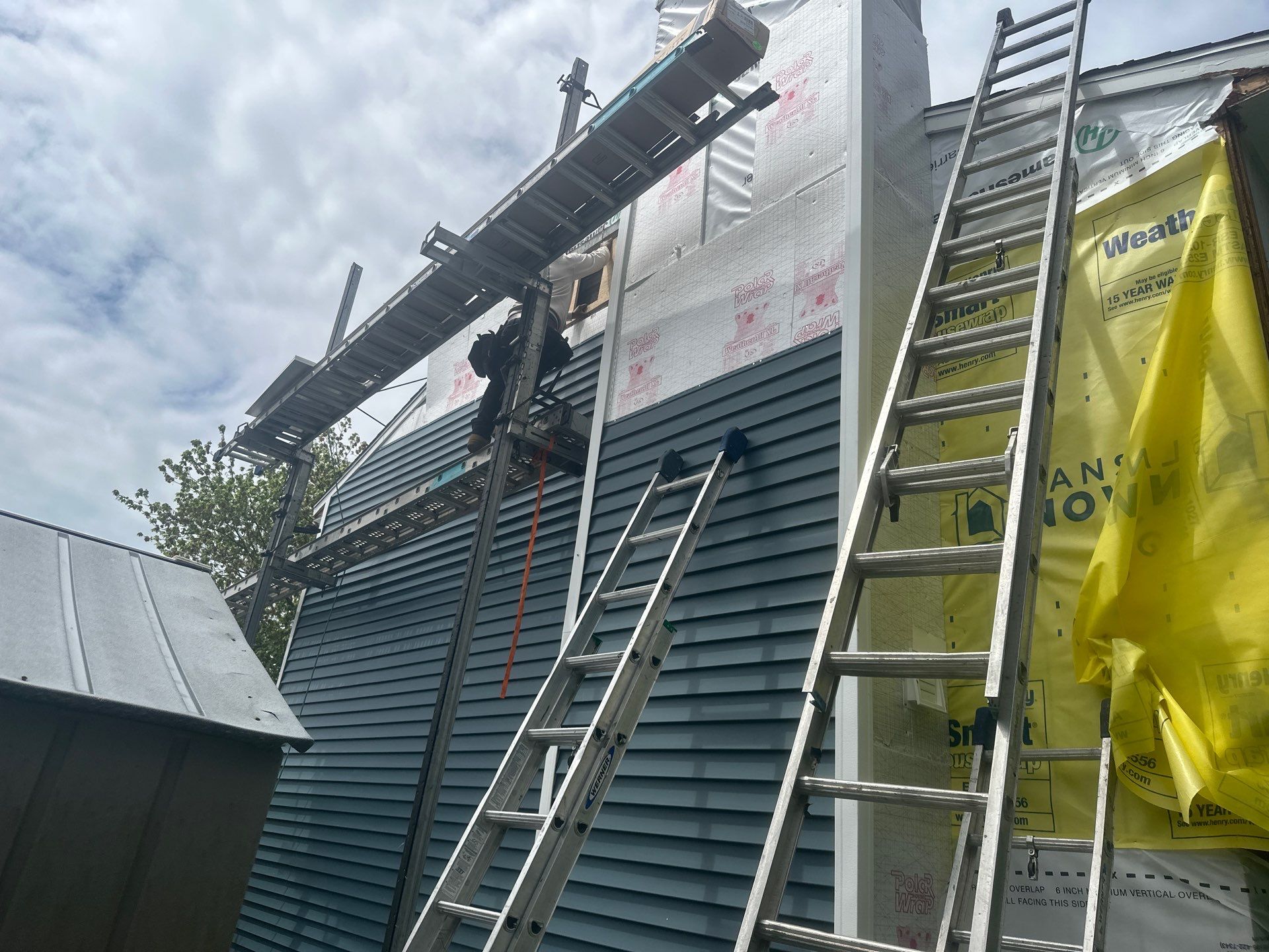 Siding Installation using Certainteed Cedar Impressions Straight Edge Perfection Shingles - D7 - Pacific Blue by A Plus Exterior