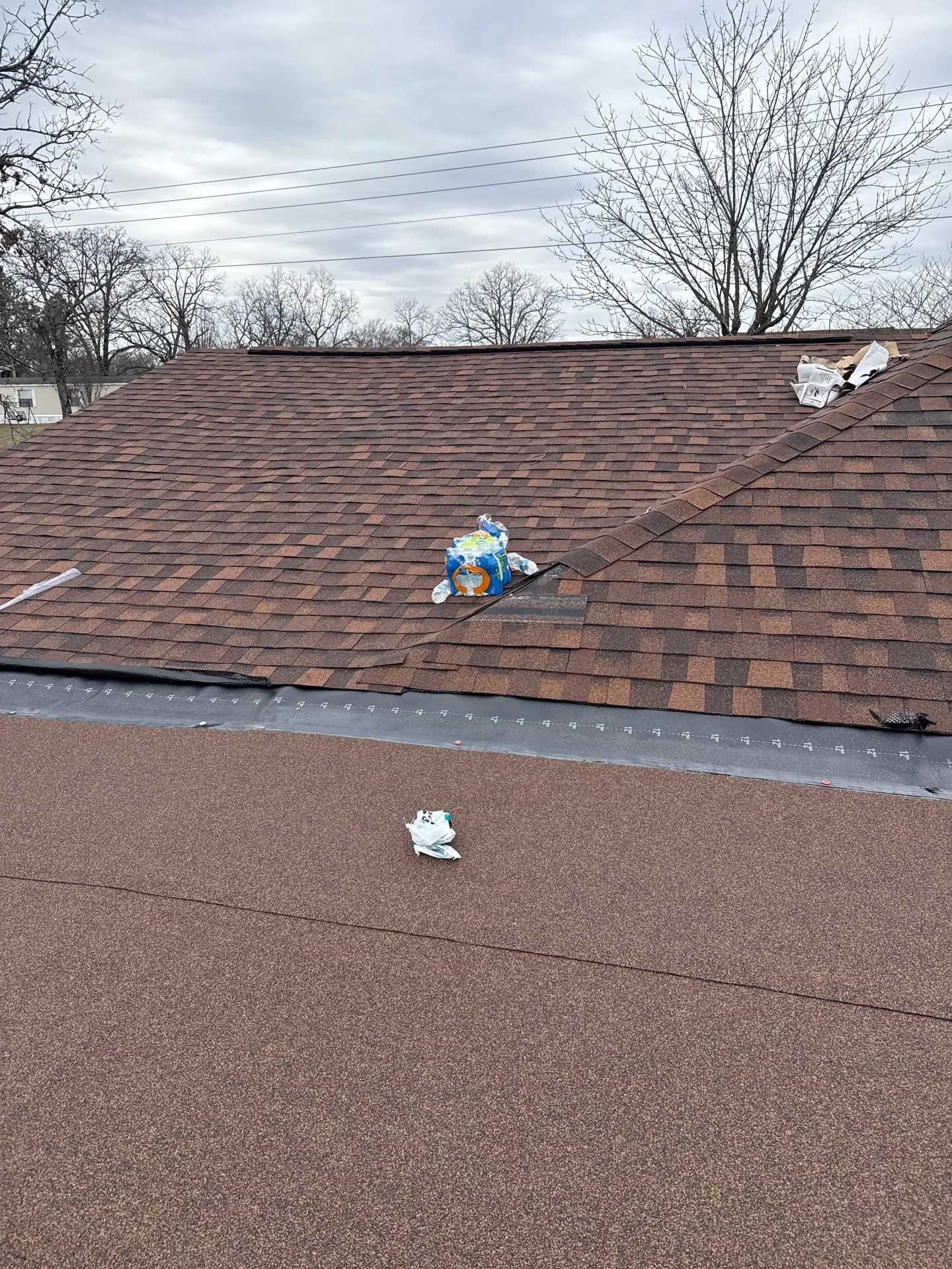 Rustic Hickory Shingles & SBS Cap & Base by In & Out Construction & Remodeling, LLC