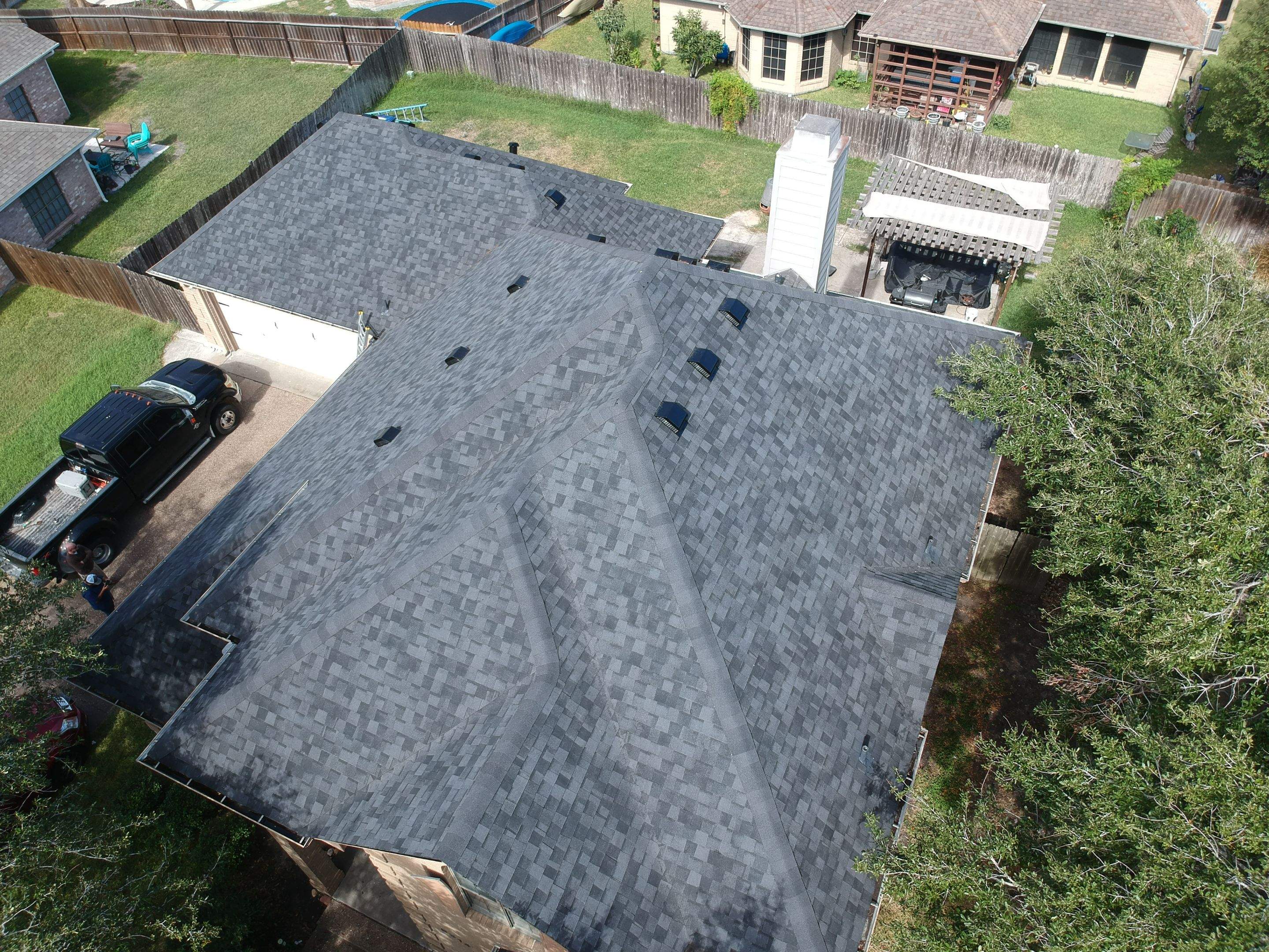 Residential Roofing Installation using Certainteed Landmark Moire Black by Galvan Roofing and Construction