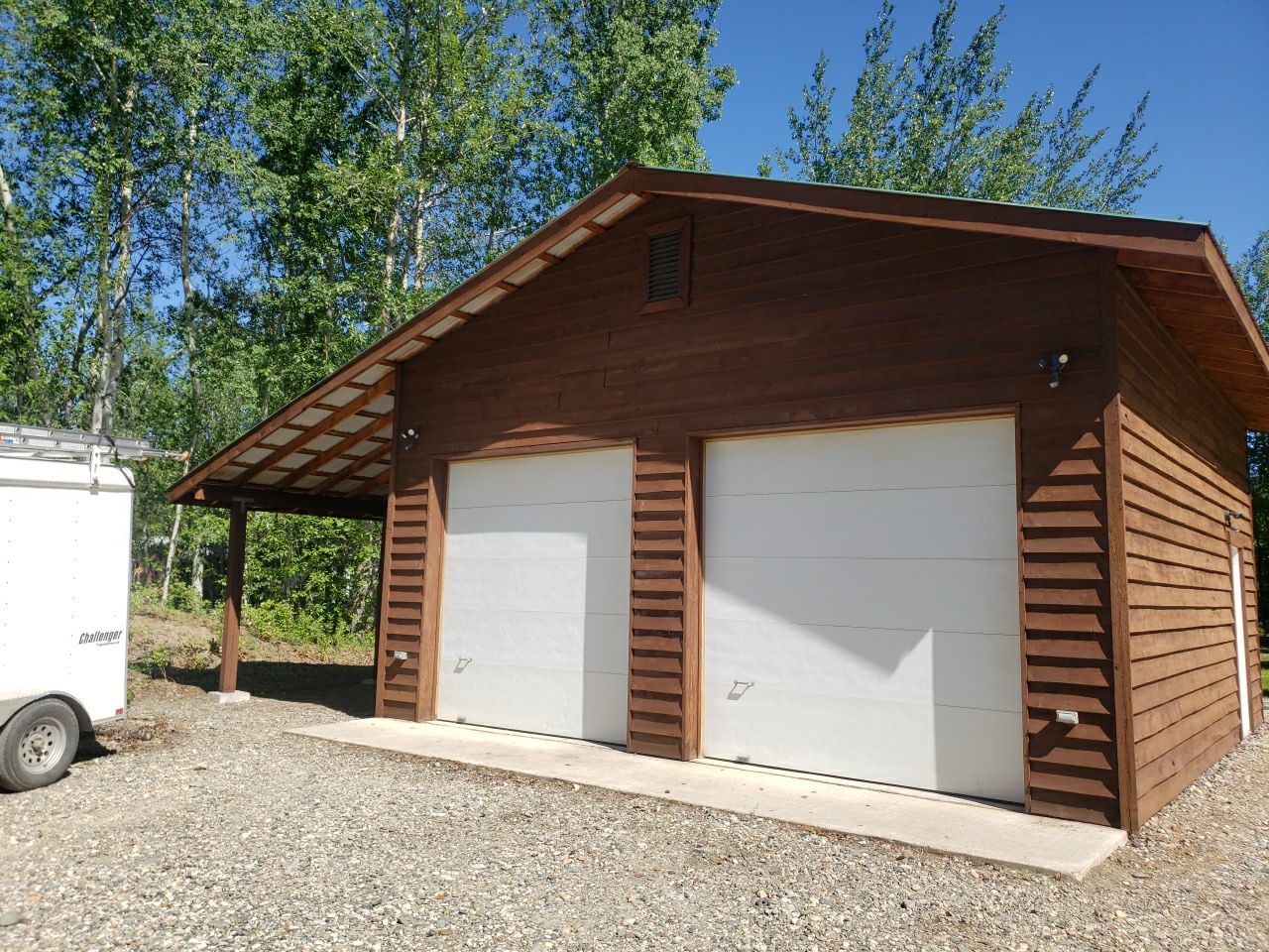 Brightened Cedar Siding & Garage by Midnight Sun Painting